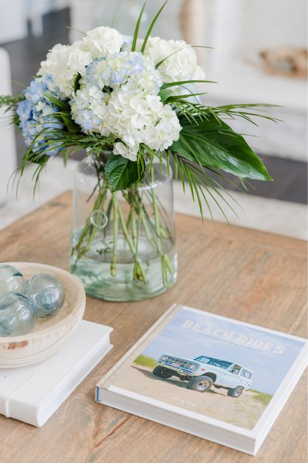 Coffee table styling and decorative neutral accents that I use in my home!  
Style this combination of decorative elements for a light and airy neutral home. 


#LTKfindsunder100 #LTKstyletip #LTKhome