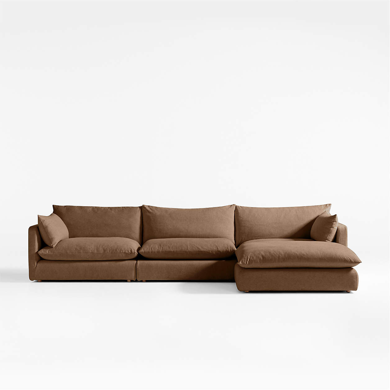 Unwind Modular 4-Piece Slipcovered Reversible Sectional Sofa with Ottoman + Reviews | Crate & Bar... | Crate & Barrel