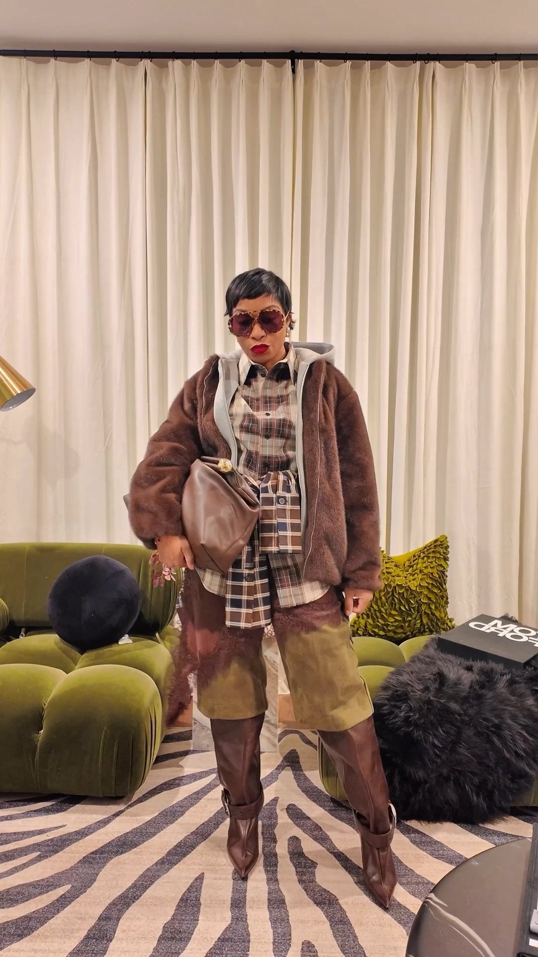 Merry Christmas Eve! Let’s go shopping!!
A Maximalist’s Dream: Layers on Layers on Layers 

Layering is a styling tool. The point isn’t to add more pieces—it’s to add intention. Each layer should create contrast, dimension, or movement within the look, not just fill space.

Great layering comes down to proportion and hierarchy. Some pieces are meant to anchor the outfit, others to soften it, and a few to disrupt it. Mixing fitted with oversized, structured with relaxed, or polished with casual keeps the look dynamic and visually interesting.

The difference between “a lot of layers” and “a layered look” is editing. Every piece should earn its place. When the layers feel deliberate and balanced, the outfit reads styled, not busy.

Which boot should I have chosen? Sound off below in the comment. Oh, and Let me know how you’re loving the look. 

Comment SHOP for the details and 🔗s to shop this look. 
https://liketk.it/5HPxP

Plaid Shirts: @hm 
Jorts: @zara 
Boots: @hm studio
Lace dress: @zara 
Bag: @hm 
Sunnies:  @bottegavenetaworld 

#layeredlook #maximaliststyle #mixing patterns #jorts #everydayoutfit #winteroutfitideas #winterstyle

#LTKootd #LTKgrwm #LTKSaleAlert