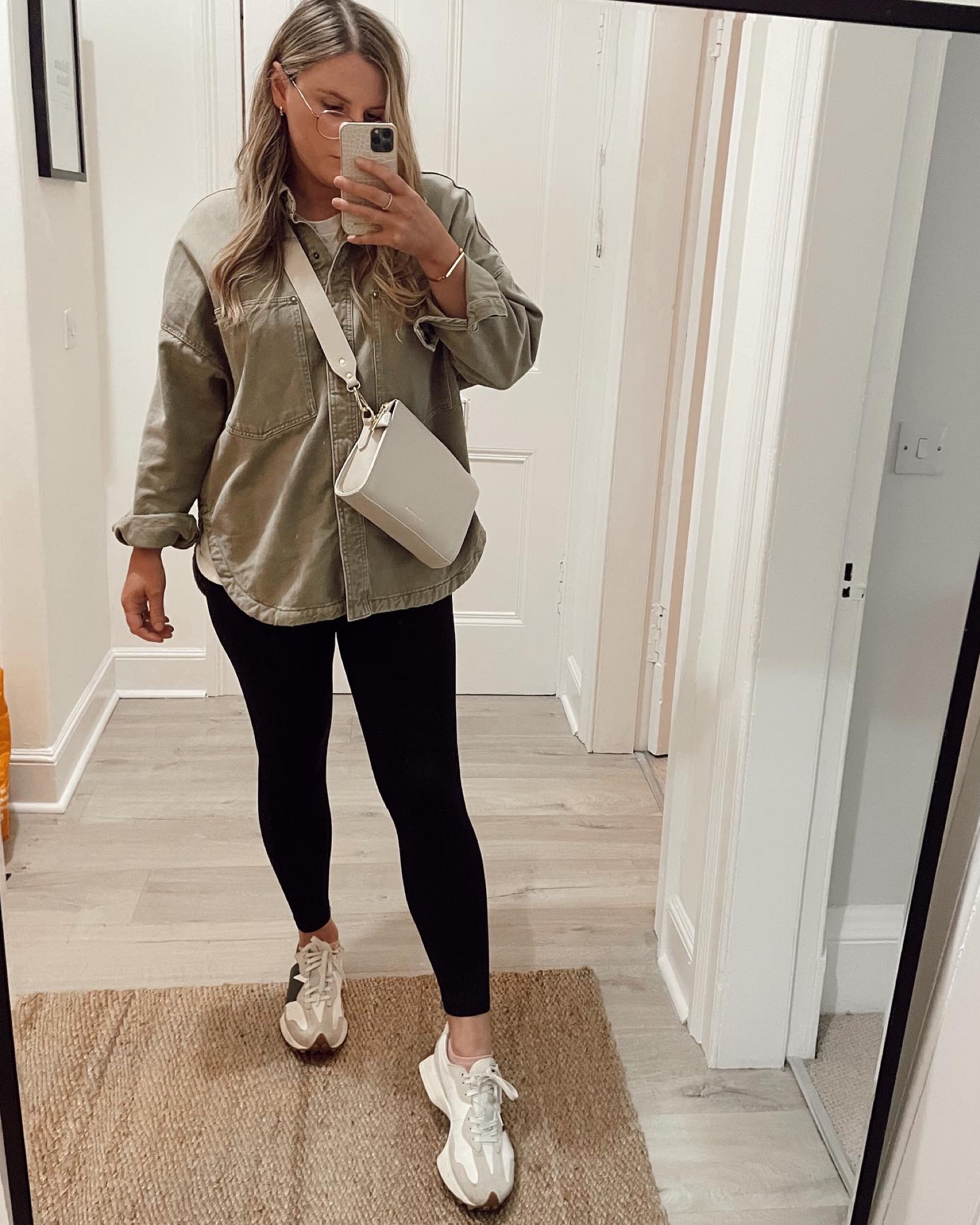 Casual neutral outfit with leggings and trainers! Minimal travel outfit 

#LTKstyletip #LTKunder50 #LTKfit