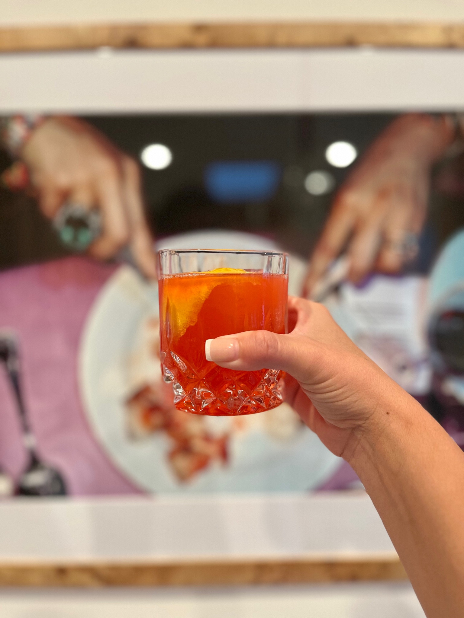 Negroni Seco 🍋
2oz Campari
2oz gin
2oz dry vermouth
Shake over over. 
Serve over large cube. 
Garnish with lemon twist  