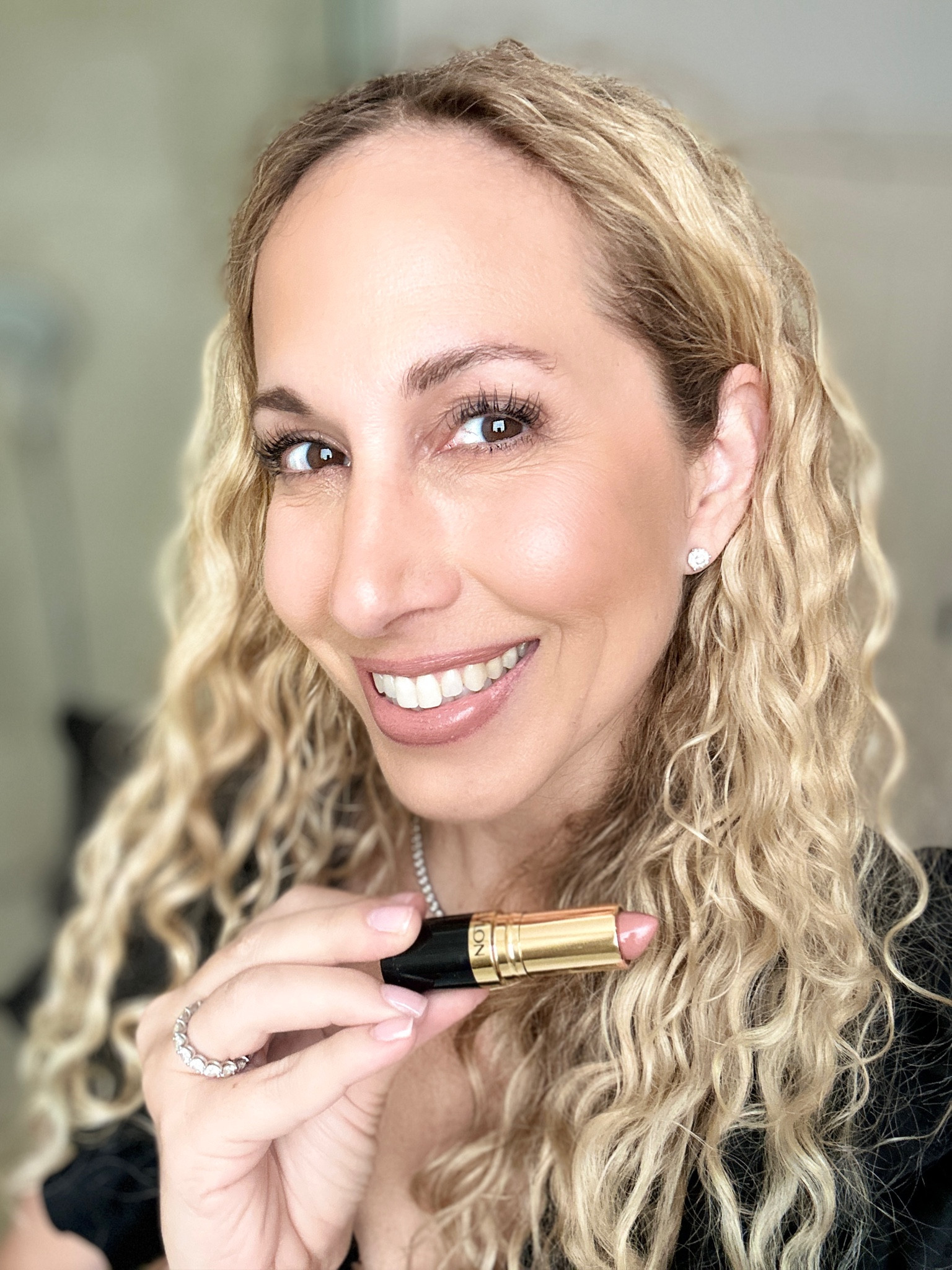 Need a new nude lipstick that won’t break the bank? This one from Revlon is super hydrating and is a great natural color with a satin finish. It’s also perfect for the latte-makeup trend! This is shade Bare It All.

#LTKbeauty #LTKFind
