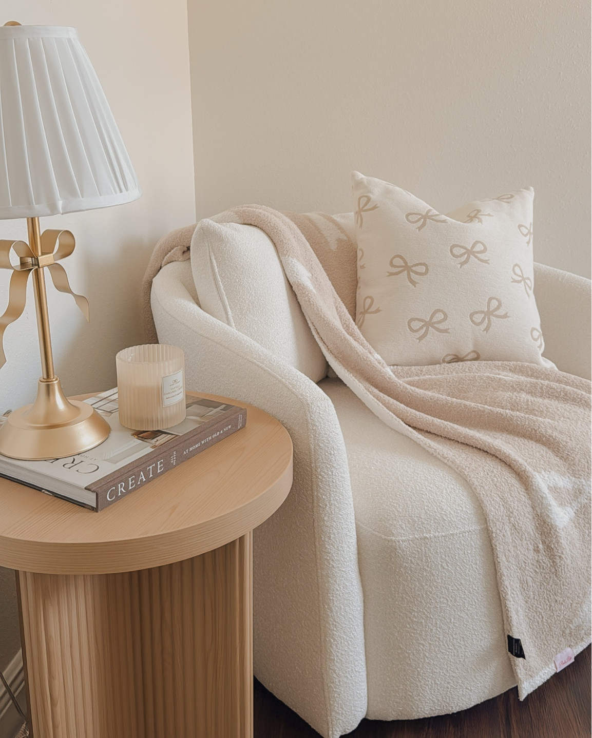 Our new cozy corner featuring our favorite Beautiful chair from Walmart✨

🤍 Bow Pillow, Lamp & Book: TJ Maxx
🤍 Bow Blanket: Pink Lily
🤍 Candle: Hobby Lobby

#LTKStyleTip #LTKHoliday #LTKHome