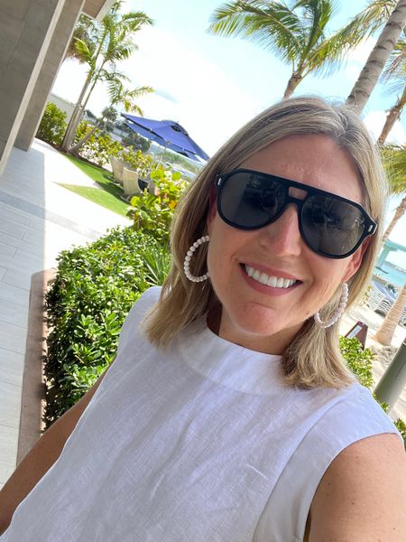 Love these sunnies! The RCA. Aviator style in a black glossy finish.  Linen white sleeveless top. Buttons up the back. Roomy fit. Runs tts. 

#LTKxMadewell #LTKFindsUnder100 #LTKSaleAlert