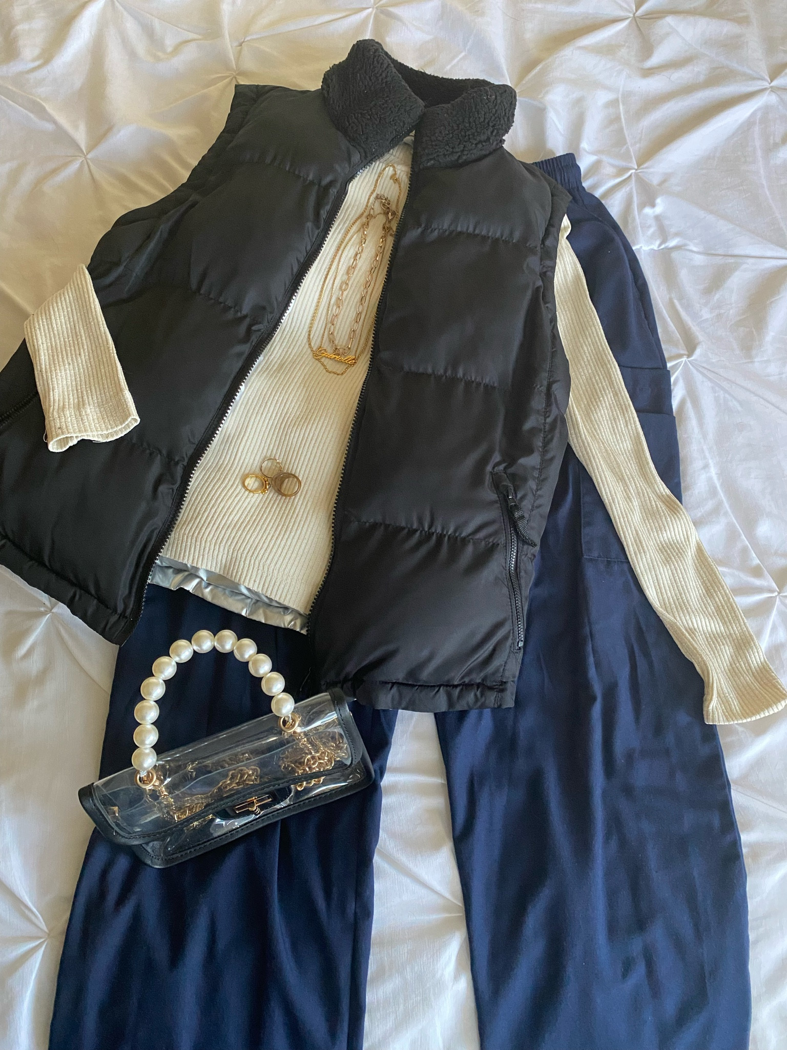 black puffer vest, puffer vest, cargo pants, navy blue cargo pants, gold jewelry, jewelry, clear bag, clear purse, pearl purse, pearl bag, purse, bag, crossbody bag, long sleeve shirt, ribbed long sleeve shirt, ribbed shirt, cream white long sleeve, cream white shirt, white king sleeve, gold necklaces, gold rings, rings, necklaces, streetwear, street style, custom name necklace 

#LTKfit #LTKstyletip