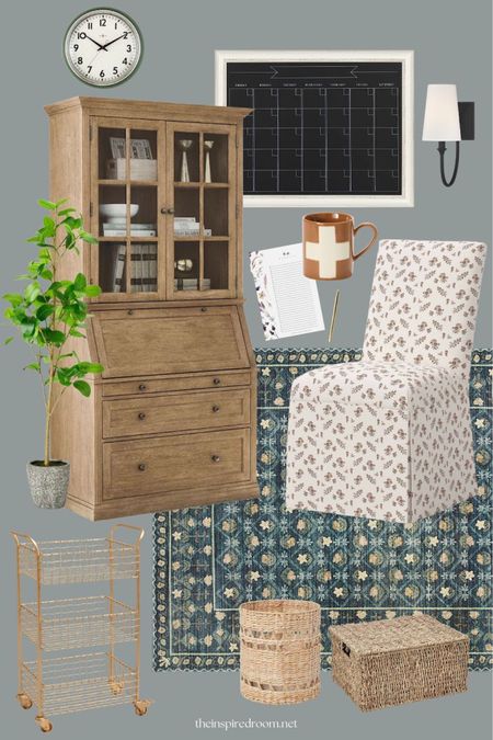 Office mood board - wood secretary desk, floral slipcovered dining chair, floral blue rug, green wall clock, framed chalkboard calendar, black wall sconce light with shade, gold wire tiered storage cart, floral botanical notepad, woven trash can, seagrass lidded storage basket, faux potted plant, Swiss cross mug 

#LTKFind #LTKstyletip #LTKhome