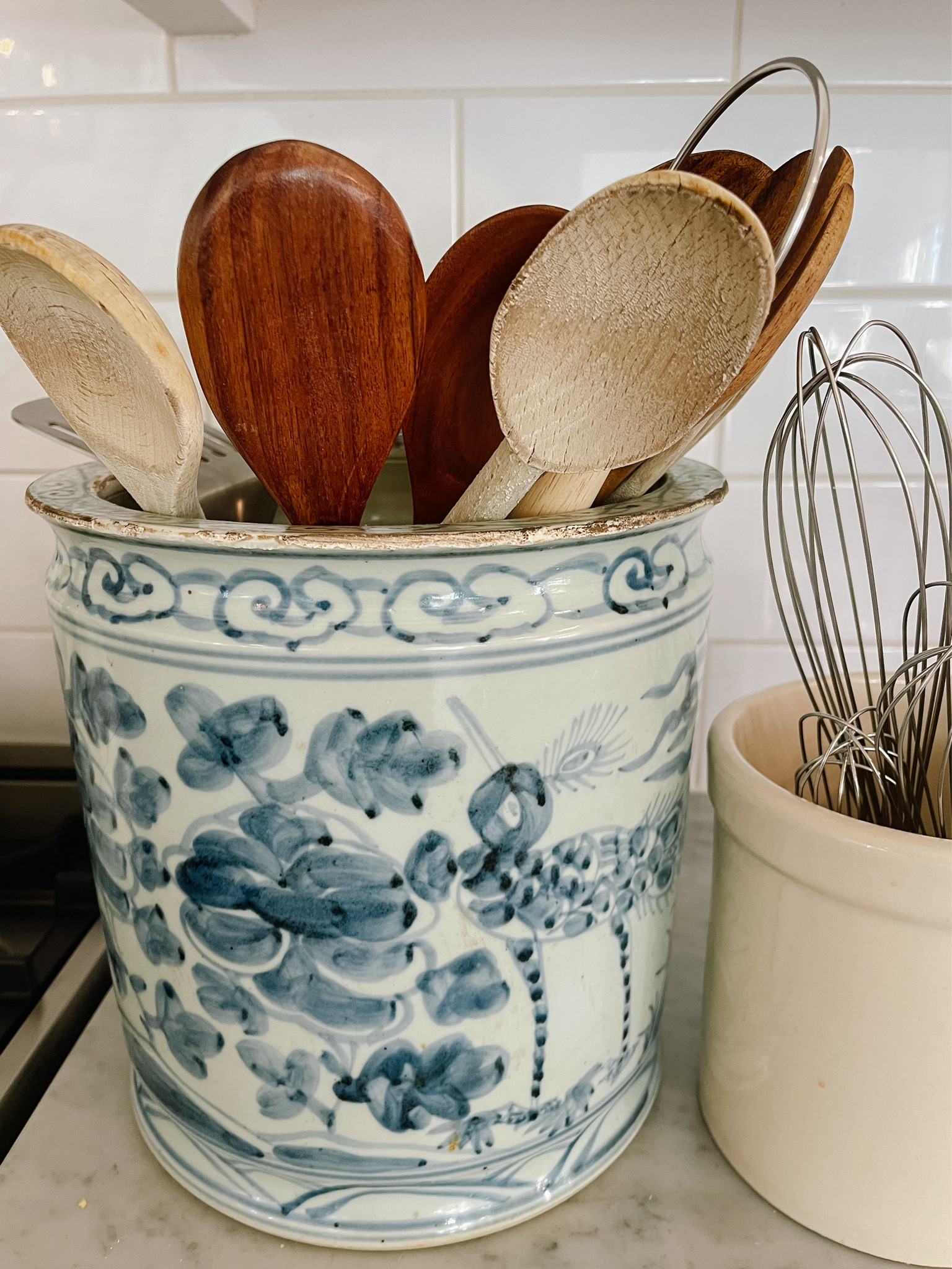 Kitchen utensil crock - traditional blue and white - kitchen counter decor 

This is my absolute favorite piece of decor on our kitchen counter! I fill the bottom with a little bit of rice and then fill it will an assortment of wooden spoons and utensils. I buy utensils everywhere from Williams Sonoma to Target to Amazon! Linking some of my favorites here. 

#LTKOver40 #LTKHome #LTKStyleTip