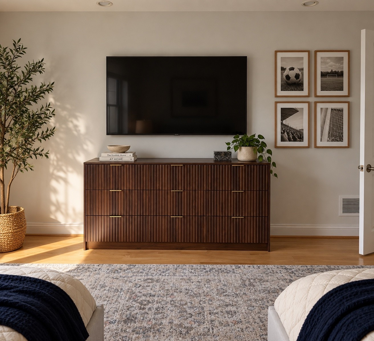 The dresser that completely changed the boys’ room 🤎 We replaced two desks with this fluted 9-drawer dresser and it instantly made the space feel more elevated + pulled together. Love the rich walnut finish and brass details — such a designer look for less. Linking it here!

#LTKHome