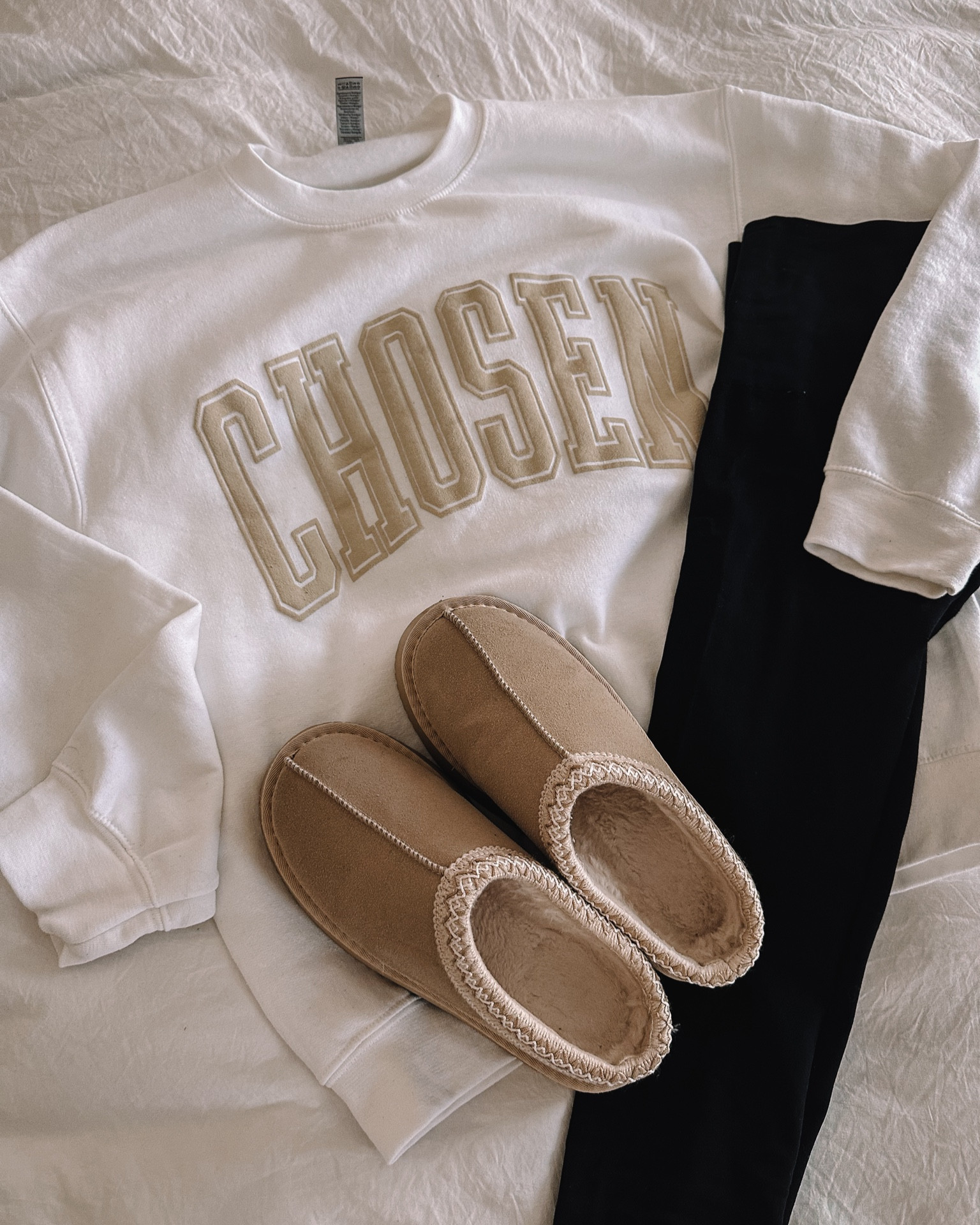 Large CHOSEN puff print sweatshirt looks super cute with leggings & ugh slippers

#LTKsalealert #LTKfindsunder50 #LTKstyletip