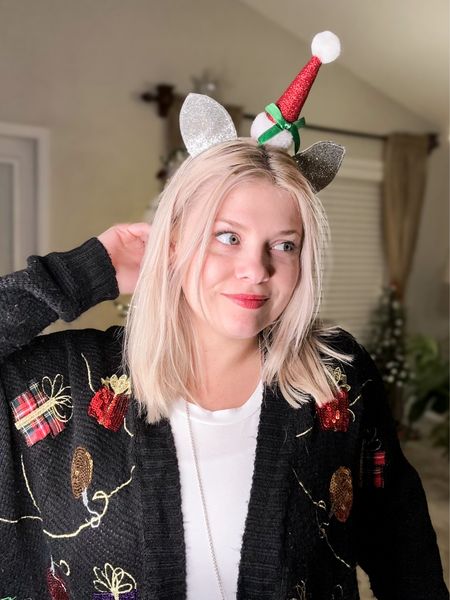 A fun look for Christmas parties: tacky holiday sweater, Santa hat headband and a fun dangling silver star necklace   

#LTKSeasonal #LTKHoliday #LTKfindsunder50