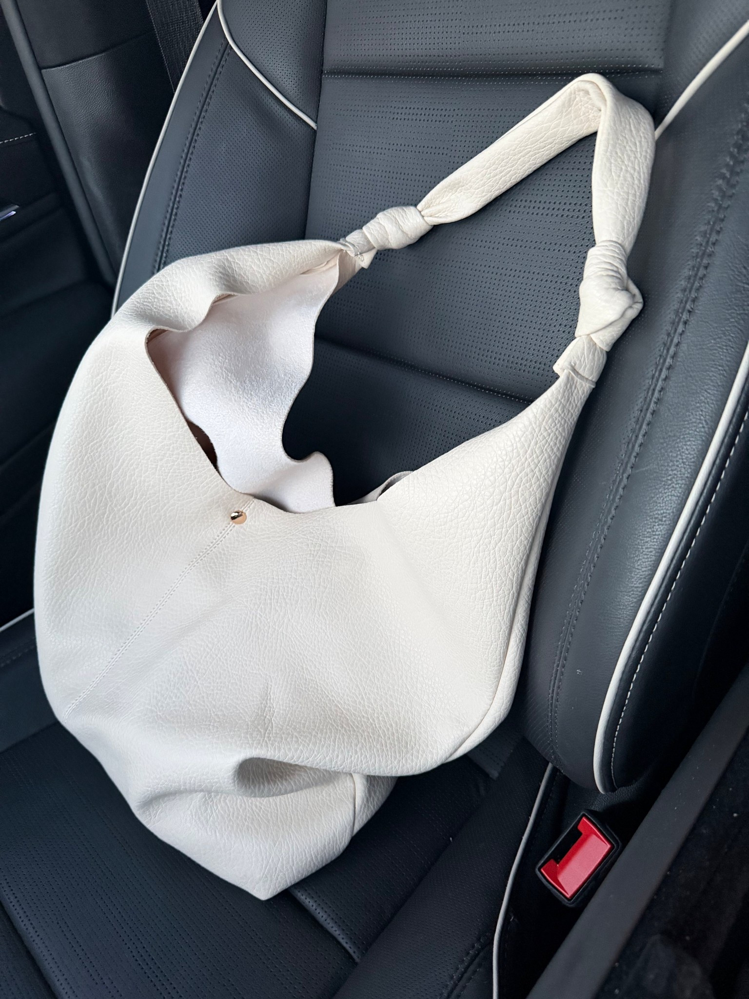 Love my love knot slouchy bag! But what do we think of the woven one I got?!? I’m OBSESSED!!! I’ll share my honest opinion of the woven too, soon. 

#LTKmomlife #LTKTravel #LTKgrwm