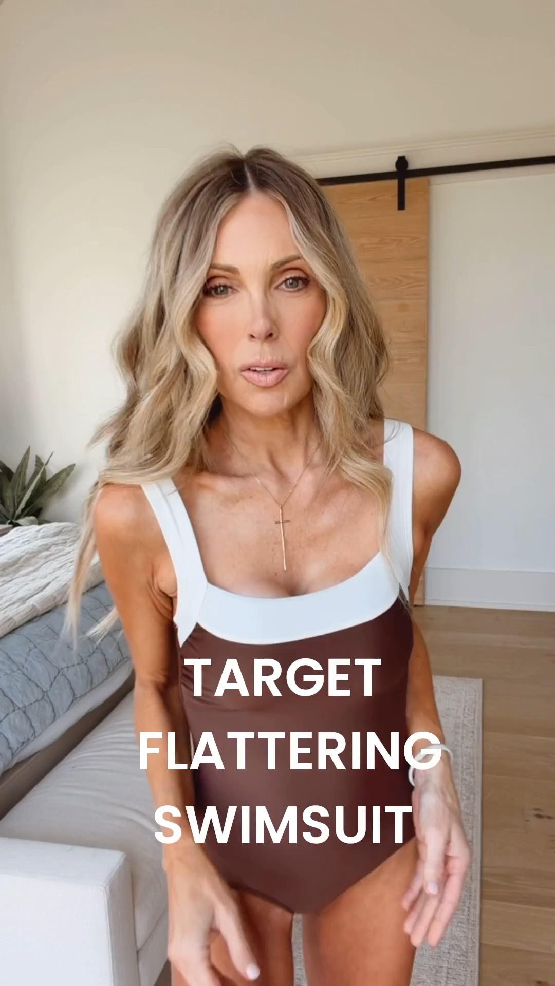 Love the deep chocolate brown and cream trim of this suit... perfect pairing with a self tan.  This is both shaping and supportive!  Also available in black. I'm wearing an XS. 

@Target 