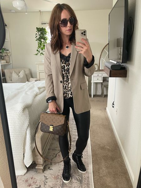 I like pairing classic pieces such as a blazer with a casual item like a pair of sneakers. Also, a bit of a feminine touch such as a hint of lace, just seems to pull the entire outfit together with the right amount of interest and contrast. 
•
•
•
#spanx #leather #leggings #blazer #workwear #casualoutfit #everydayoutfit #neutraloutfit #lacecami #louisvuitton #lvpochettemetis #luxuryhandbag #lvhandbag #targetfind 

#LTKitbag #LTKshoecrush #LTKstyletip