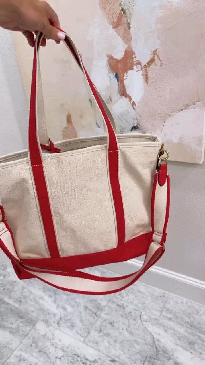 A canvas tote with a pop of red just makes everything more fun. I love that this one has both top handles and a longer strap, so it can actually keep up with a full day instead of just looking cute.

canvas tote bag, red tote bag, everyday bag, shoulder bag, casual accessories, carryall tote, women’s handbags, everyday accessories, travel tote, tote bag find, functional handbag, hauteandhumid

#LTKTravel #LTKSeasonal #LTKOver40