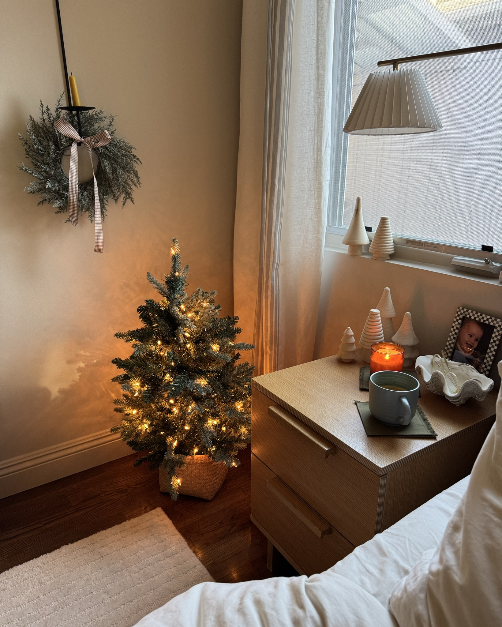 a little holiday bedroom refresh with @allmodern!!! in our tiny house, everyone always ends up in our bedroom due to kid bed jumping/wrestling/etc when we're hosting, so i really wanted to spruce up our room for the holidays and let's face it - literally no amount of candles and dim bedside lights can beat the glow of a little christmas tree!!!  

#allmodernpartner #modernmadesimple

#LTKHoliday #LTKSaleAlert #LTKHome