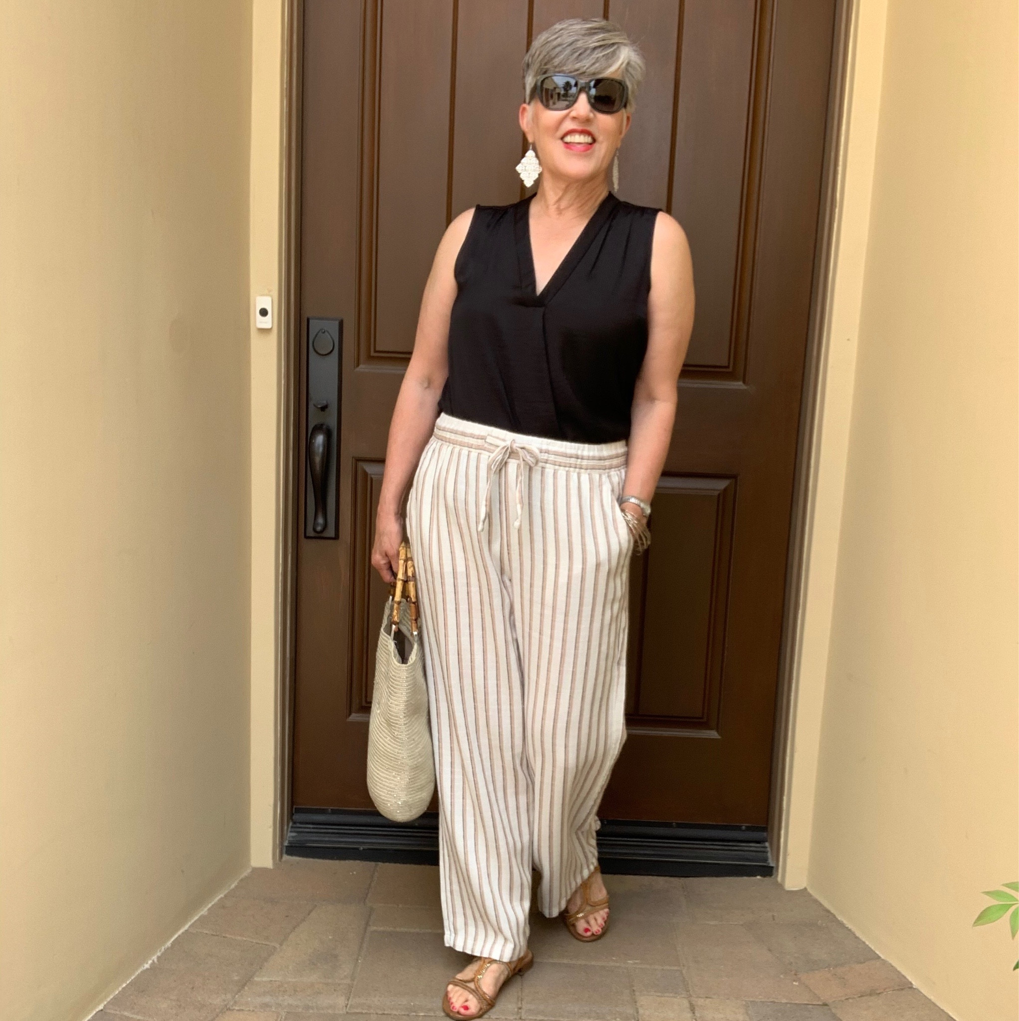 Great summer look that with a jean jacket would transition perfectly to fall! Black Madewell v neck tank and Madewell linen pants .

#LTKSeasonal #LTKunder50 #LTKsalealert