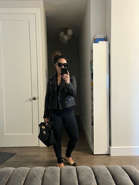 Layering up. Ready for spring. I love a leather jacket for spring. Did you know leather jackets are supposed to fit a little stiff and tight when you first buy them? As you wear a leather jacket, the leather will stretch and mold to your body for the perfect fit. I paired this look with a ballet flat. Classic. 

#LTKtravel #LTKover40 #LTKworkwear