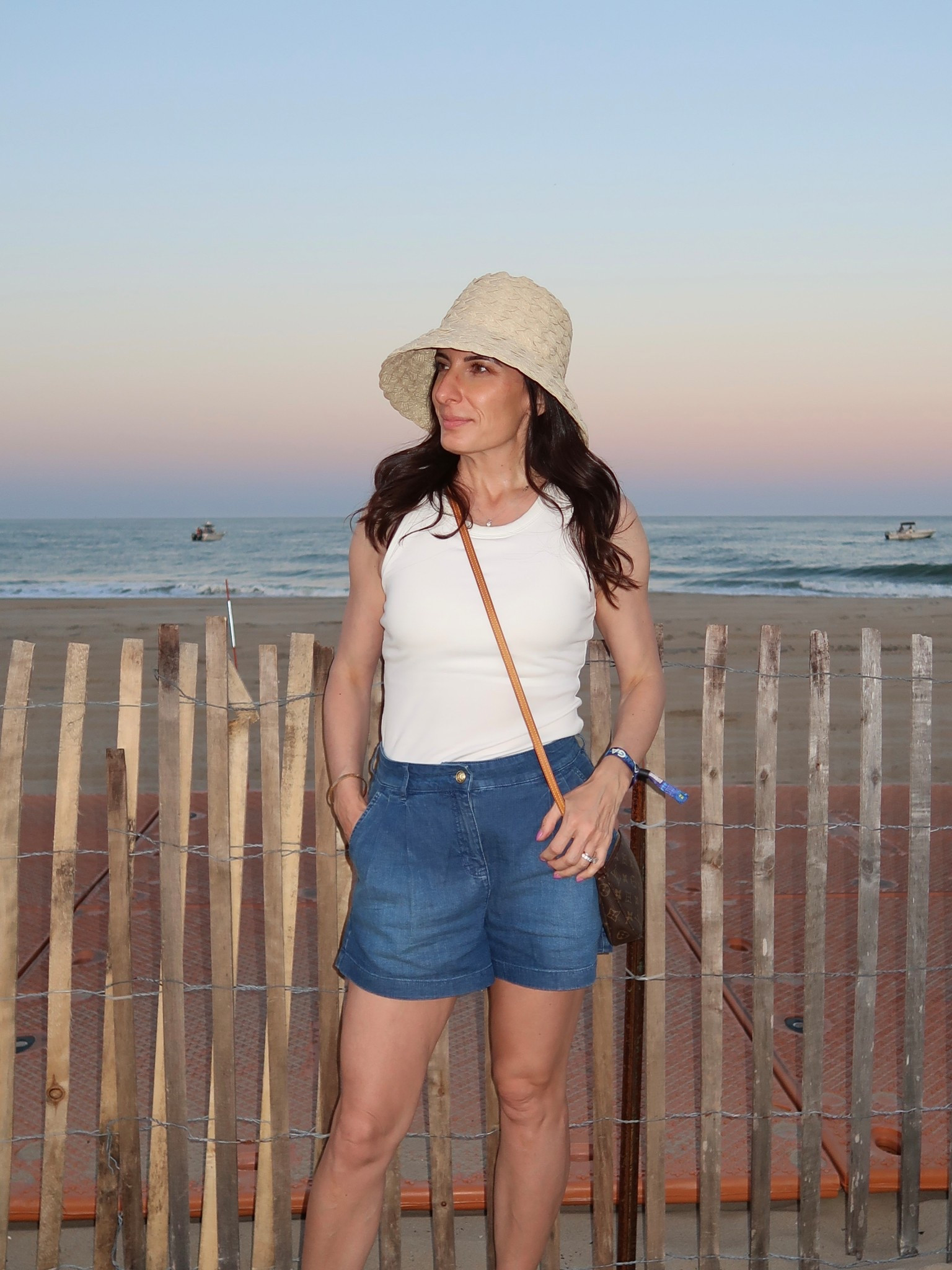 Jcrew shorts and built in bra top from
Amazon. Monday swimwear rattan woven hat 

#LTKMidsize #LTKOver40 #LTKSaleAlert