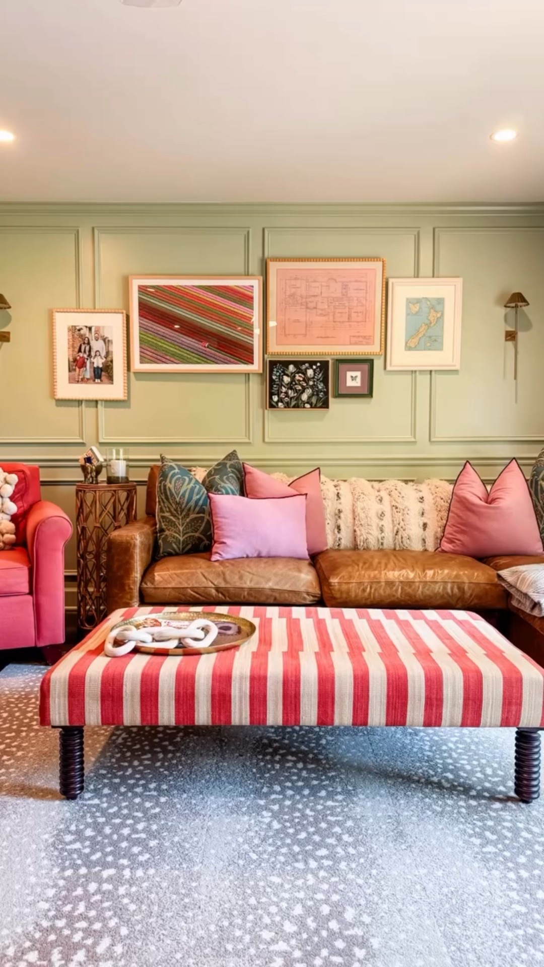 When the @showhouseindy wrapped, I found that I was itching to do a project in our home. I had been collecting some really meaningful pieces of art and also felt excited to lighten up the paint color in our family room.

In true “If you Give a Mouse a Cookie” fashion, painting led to adding in wainscoting, which led to hiring @indyartinstallers to professionally hang this fun collection (because you can’t just throw a nail in wainscoting).

Add some battery operated sconces from @pookylightsus and I’d say, we’ve just refreshed my new favorite room in the house!!

Paint Color: Antique Jade by @benjaminmoore 
Wainscoting: @radfordwoodworks 
Framing: @northside_glass 
Art: @graymalin, @tiffanyskillinginteriors, @stephanie_carignan 
Art Installers: @indyartinstallers