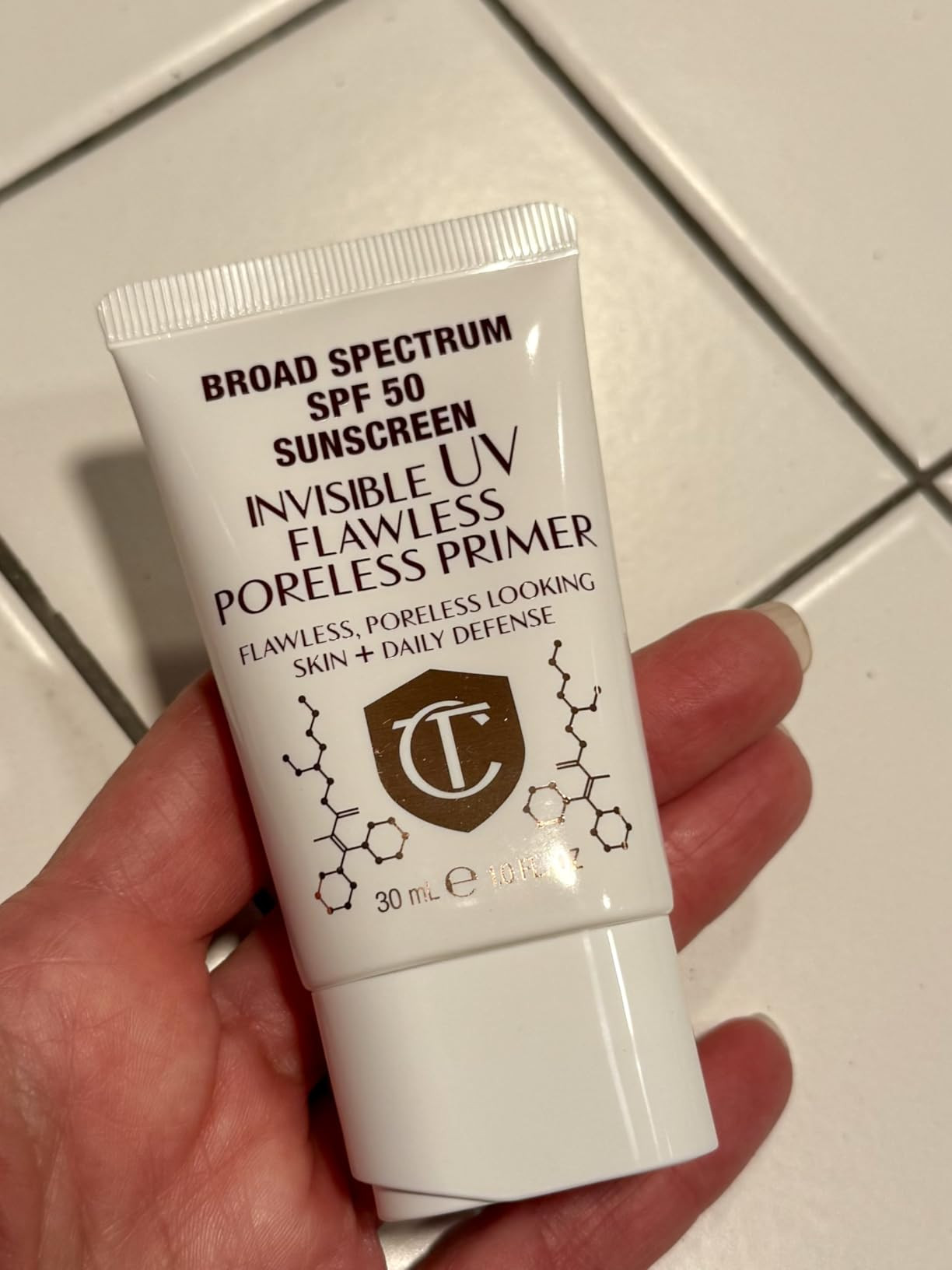 Charlotte Tilbury Invisible UV Flawless Makeup Primer - Broad Spectrum SPF 50 Sunscreen & Poreless Face Primer - Enriched with Hyaluronic Acid to Hydrate, Protect & Prime Skin | Amazon (US)