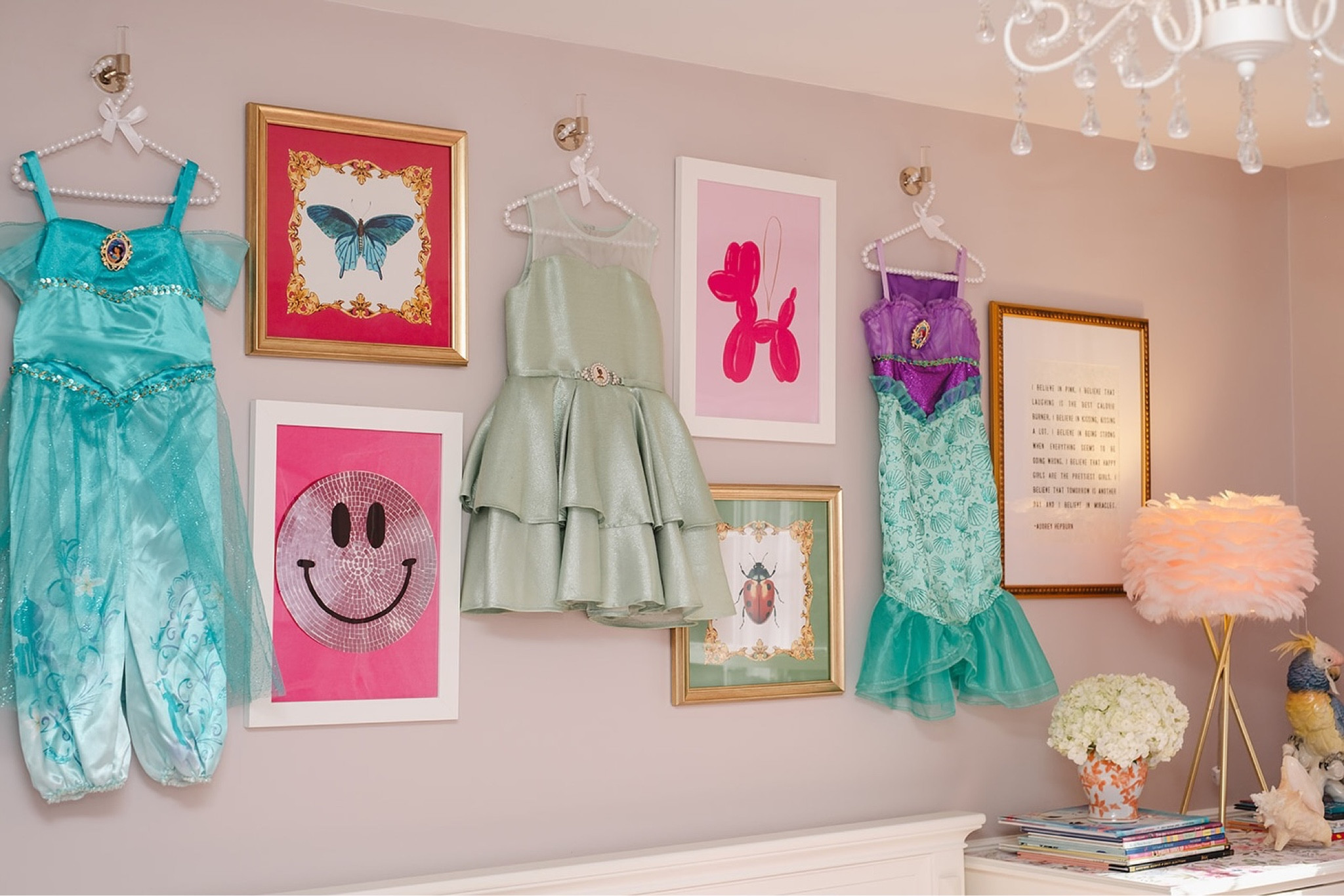 Your home should reflect who you are! So, when it came to wall art in this almost 7 year old girl’s room, I suggested incorporating some of her favorite dress up pieces into a gallery wall for display. The result is a mix of the princess dresses with fun art we found and a print her mom had bought for her and we had framed. It’s personal, whimsical and girly 🩷💖💛

Photography by @lifeinthemagichour 

#gallerywall #dressup #girlsroom #princessroom #kidsinteriors #kidsinteriorstyling