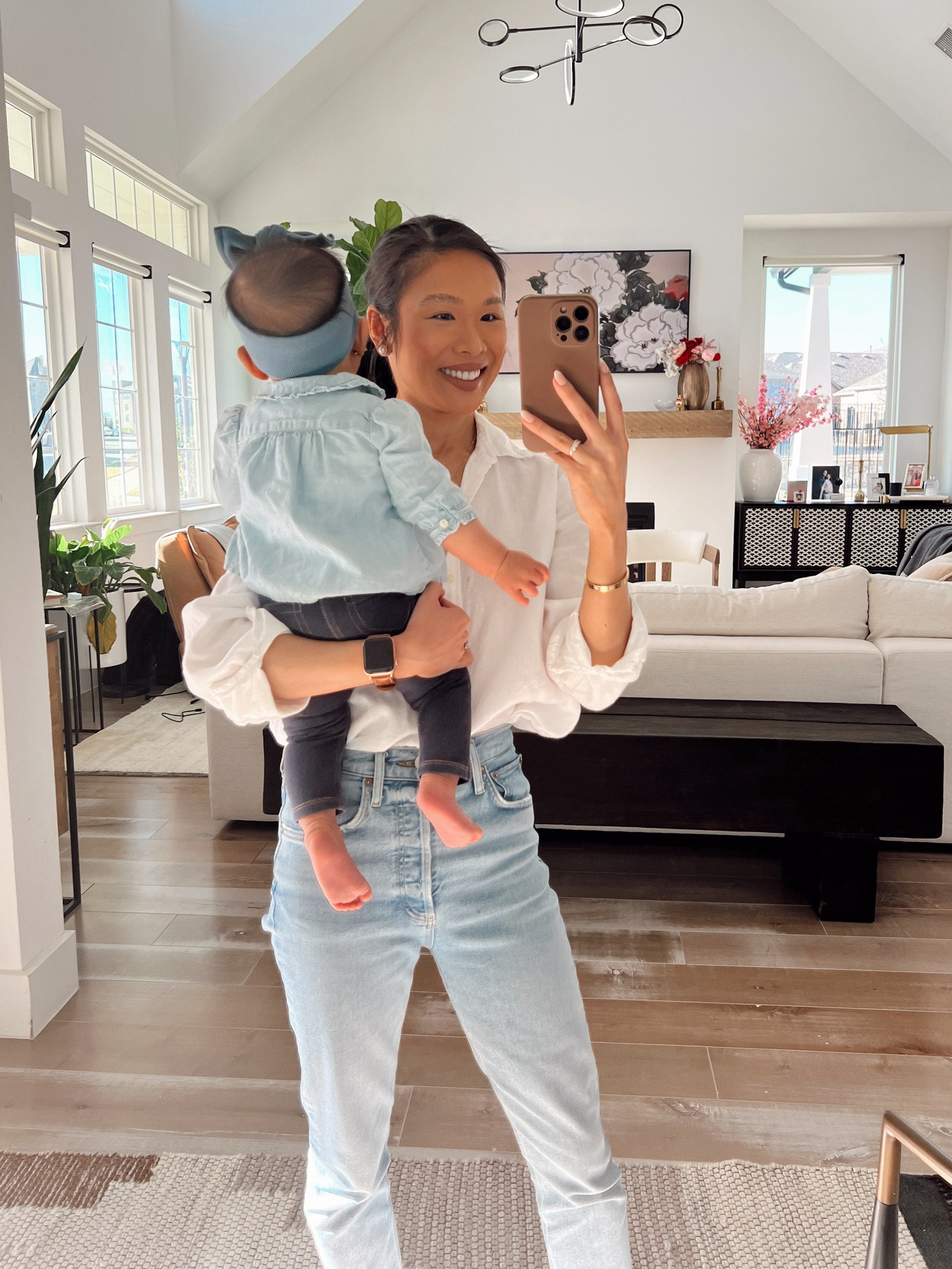 Spring outfit for mom and baby girl with a white linen button up, Agolde Riley, crop straight leg, jeans and white sneakers with Pearl and diamond earrings. Mommy and me outfit with baby girl wearing a chambray shirt and jean leggings  

#LTKstyletip #LTKbaby #LTKfamily