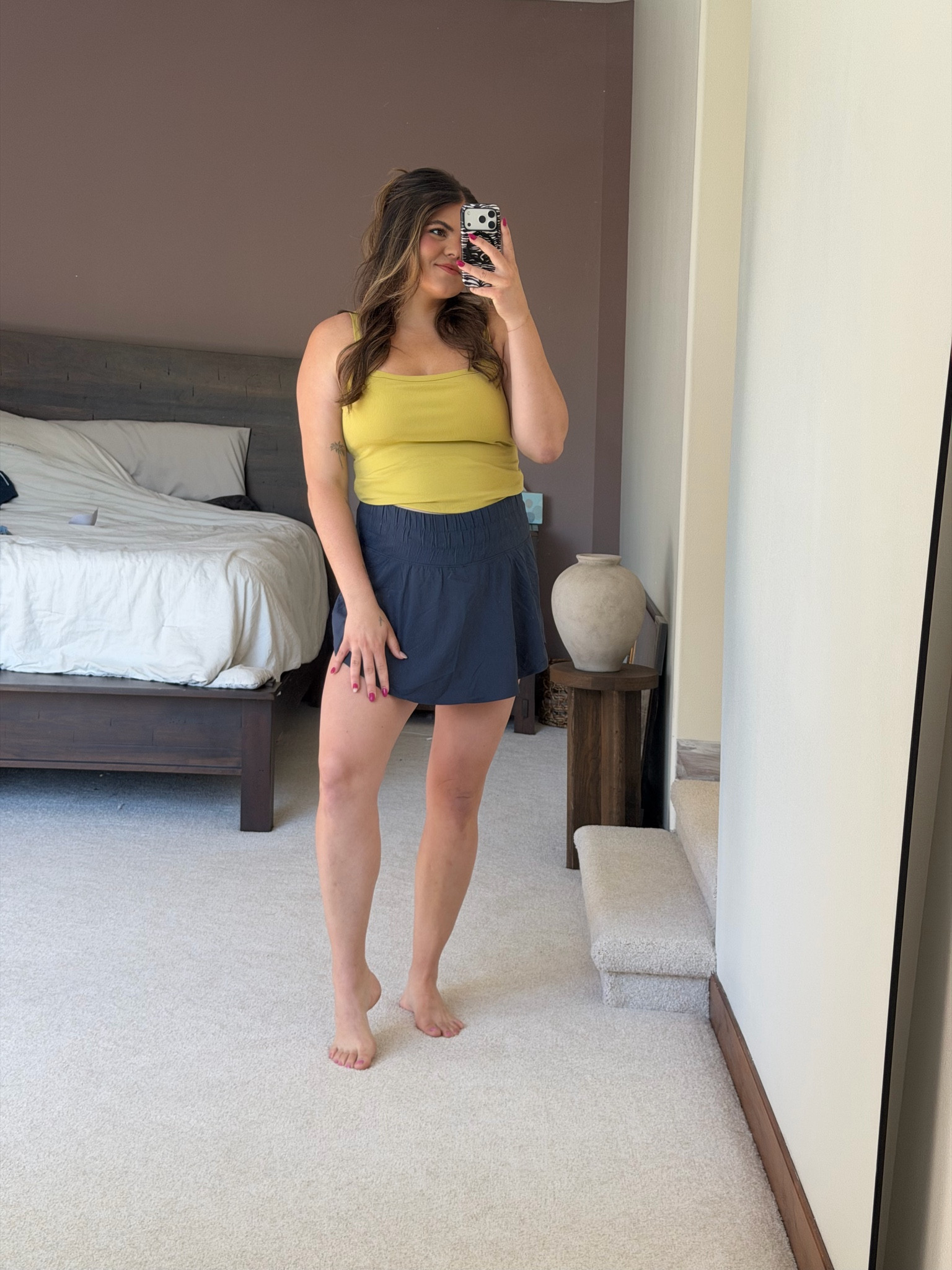 Sports mom casual summer outfit from Amazon!! My favorite built in bra tank top and this skort has built in shorts that feel like running shorts, not tight line bike shorts. 

Midsize, size 12, size 14, mom style, curvy outfit