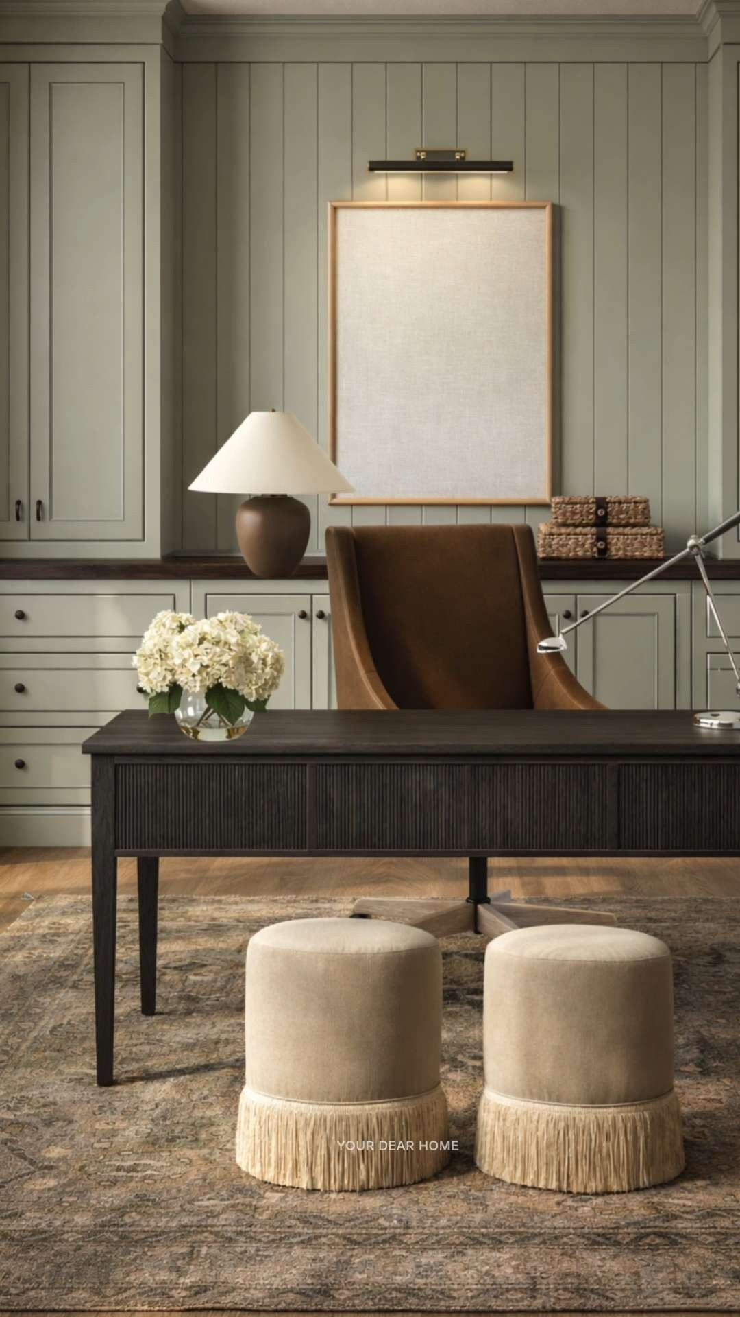 If you want your home office to feel calm but still elevated, this is such a good place to start. The soft sage cabinetry paired with the darker desk adds just enough contrast without making the space feel heavy. 

 #LTKHome
