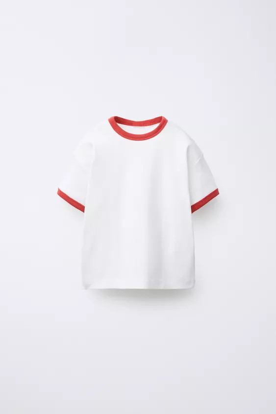 T-shirt with round neck and short sleeves. Contrasting trim detail. Raised print on back. | Zara US