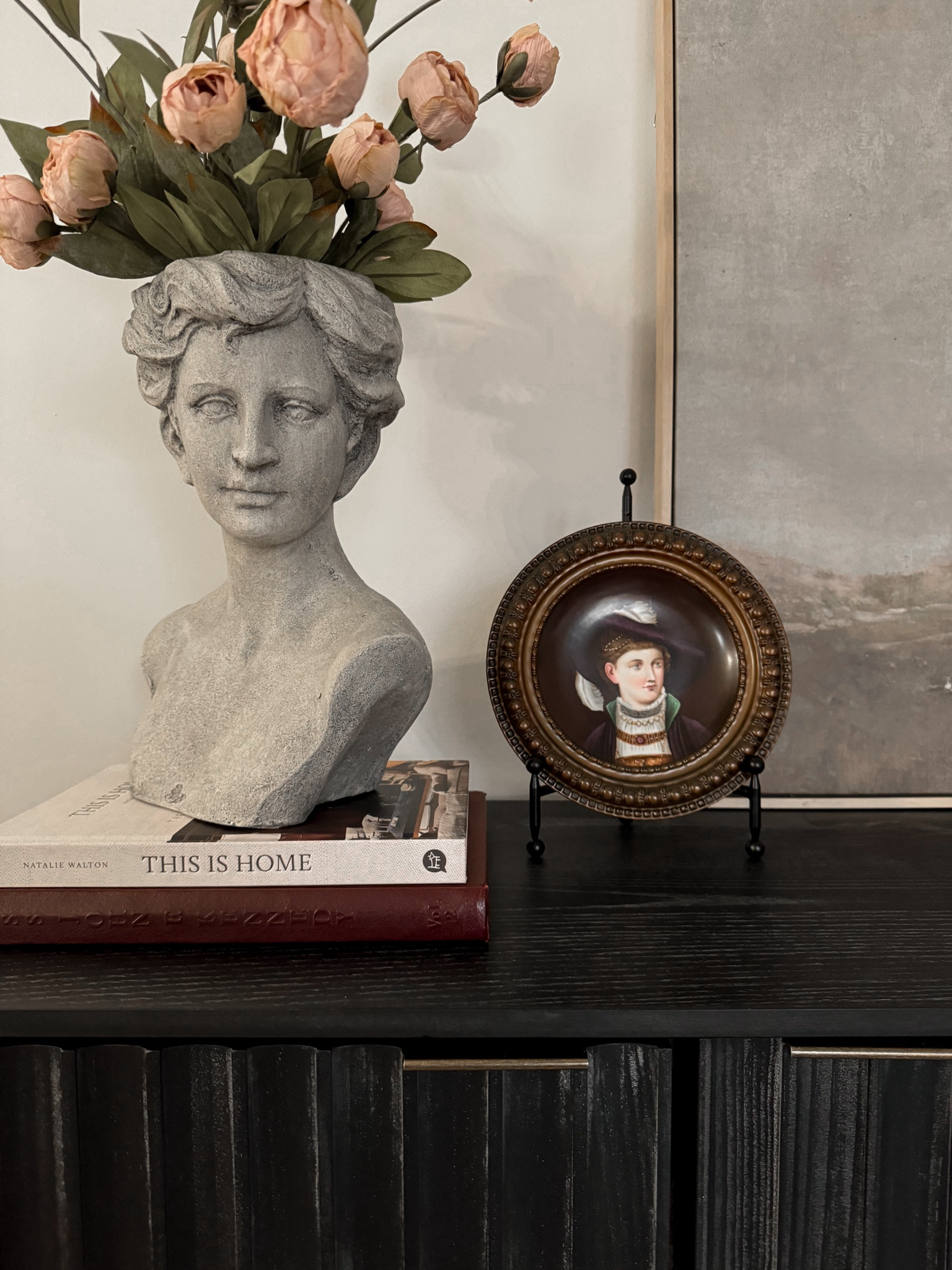 Moody antique decor. Console table decor, cabinet decor, sideboard decor, moody living room, antique decor, homegoods find, bust decor, viral peonies, Michael’s peonies 

#LTKHome