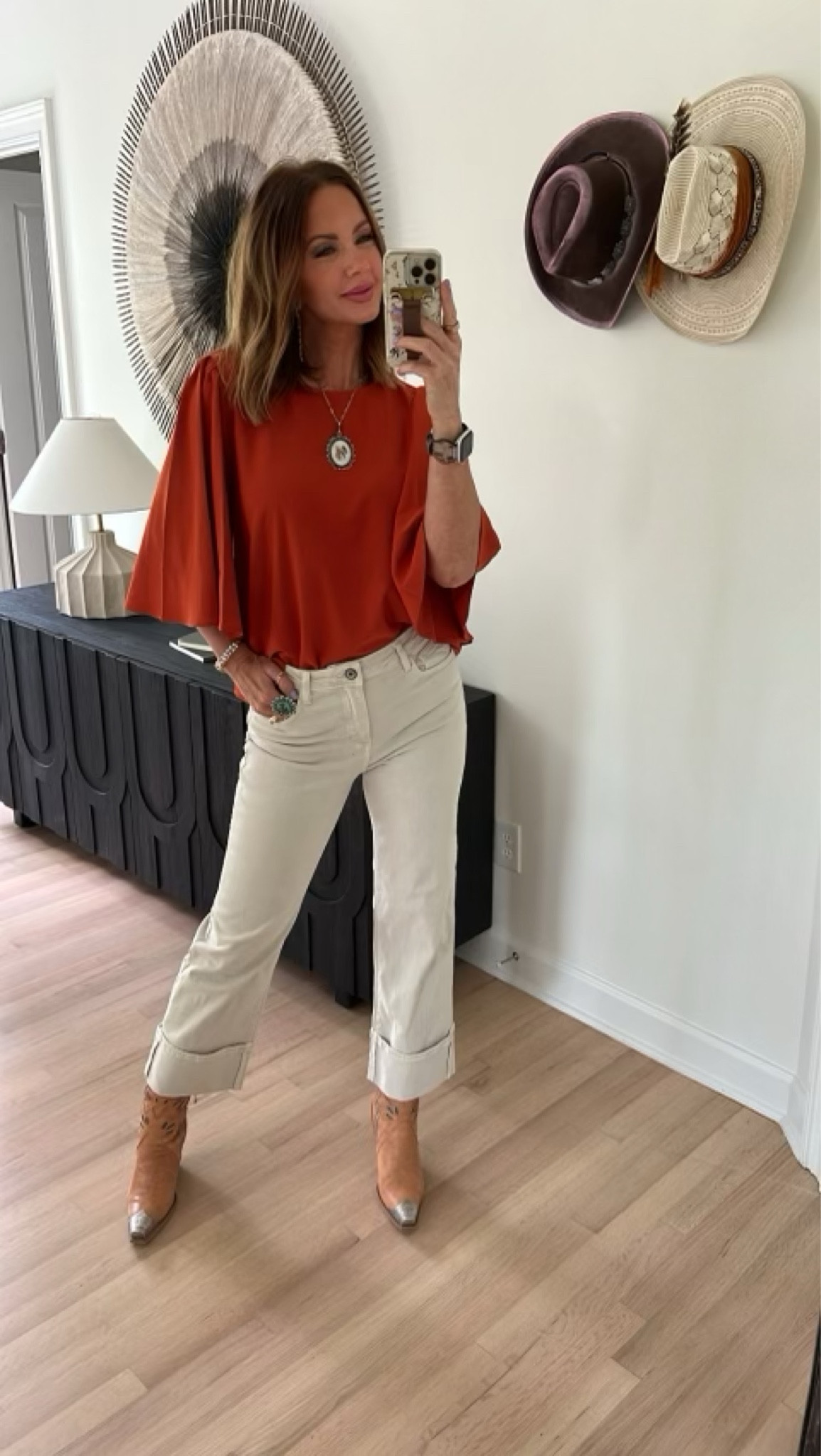 Merrill top in Rust and Adrian jeans from Avara linked! Runs TTS, I’m wearing a medium in both. Blakely Western boots from Free People and jewelry from @goldielew_ also linked (similars included for sold out items). Code BETSY works for GL. ❤️#LTKSale 

#LTKSeasonal #LTKHoliday