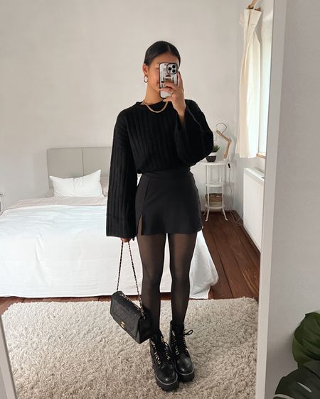 All black outfit with a mini skirt, knit sweater and fleece tights 

#LTKeurope #LTKHoliday #LTKSeasonal