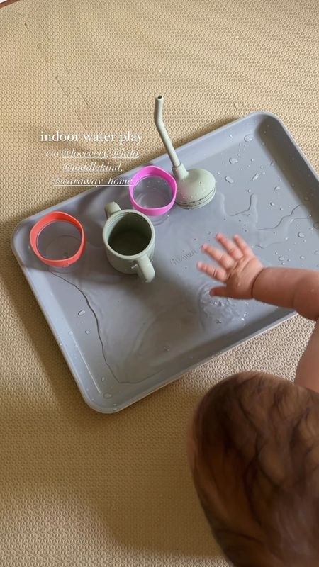 Baby water activity 〰️ cup with straw is LALO, stacking cups are lovevery, puzzle playmat is toddlekind and sheet pan is caraway home 

#LTKBacktoSchool #LTKbaby #LTKfamily