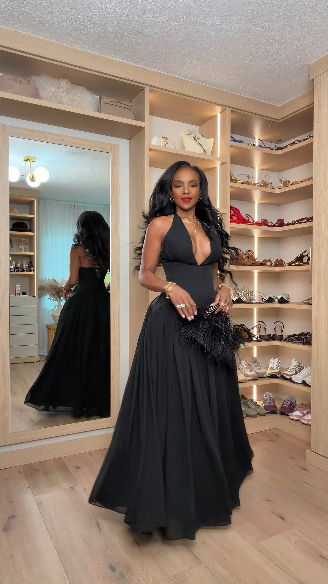 ✨ Black-tie elegance in @leau  
This deep-V halter gown is one of those show-stopping silhouettes that moves beautifully with every step. The fitted waist, flowing skirt, and luxe neckline make it an effortless glam moment for any holiday or formal event.

Perfect for weddings, galas, or any night you want that elevated timeless look.

Wearing: halter gown  
Kira’s measurements: 5'4”, 138 lbs, 34D, 27" waist, 40" hips  

Flowy black gowns, formal holiday looks, evening dress styling, elegant statement outfits, special-occasion fashion essentials.

Follow me on Instagram and YouTube @kirasfashionfinds

#LTKHoliday #LTKgrwm #LTKPetite