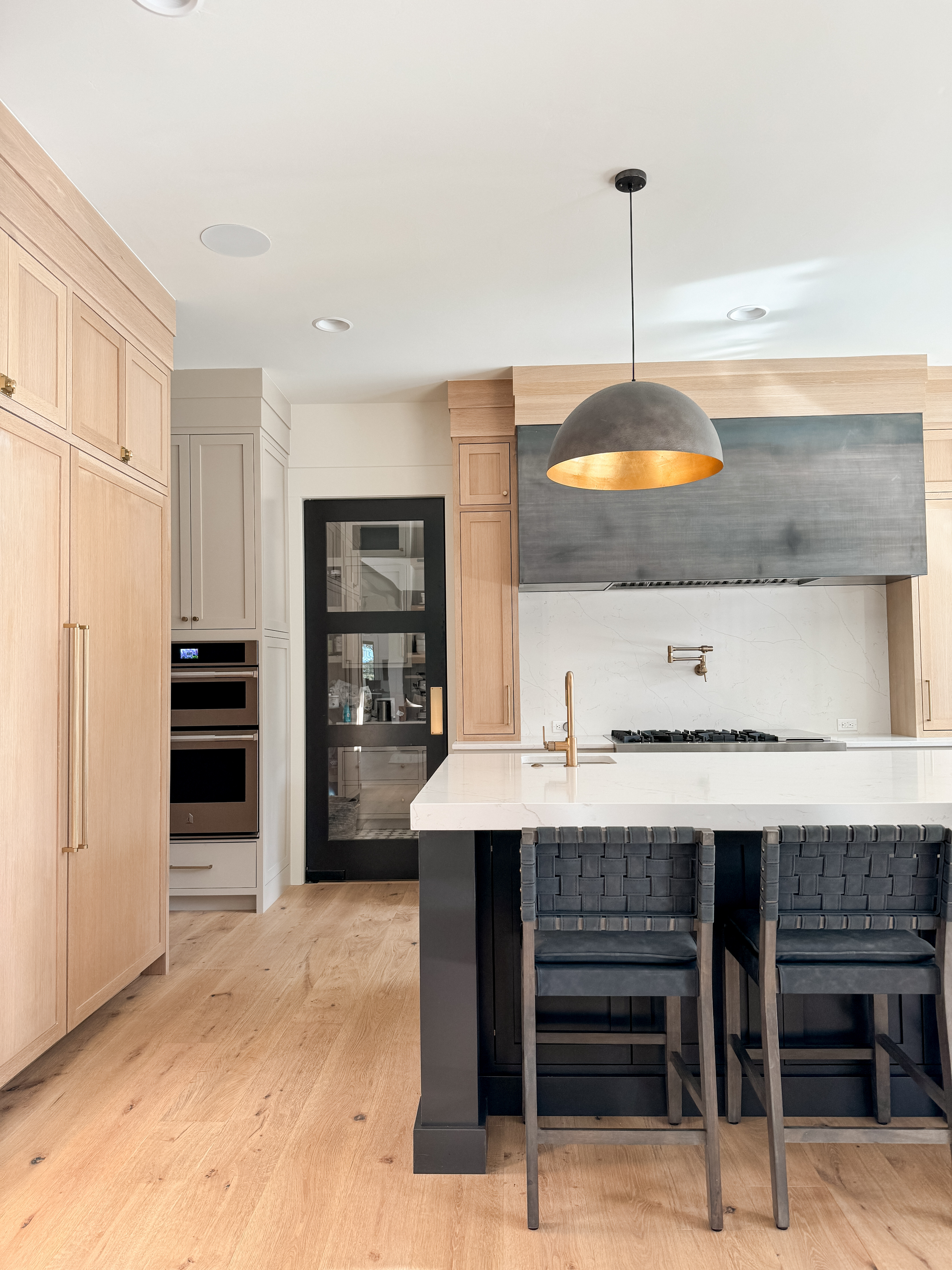 These are the Sigmund pendants in the largest size. The gold interior is stunning. 

 

#LTKHome #LTKStyleTip