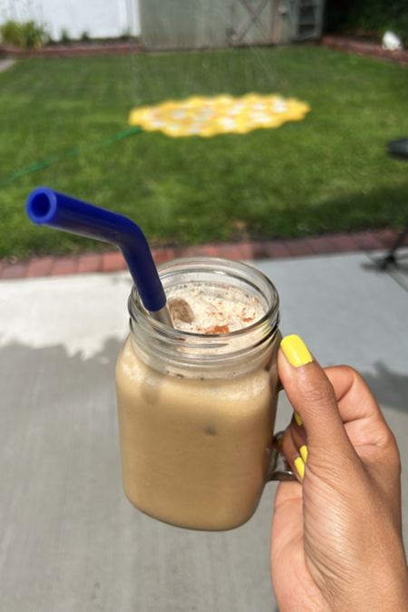 Chilling vibes ☀️ Enjoying a refreshing iced coffee in a mason jar with a reusable stainless steel straw. Nailed it with bright yellow polish 💅 while the kids have a blast at the splash pad 💦 #SummerVibes #IcedCoffeeLove #FamilyFun

#LTKSeasonal #LTKunder50 #LTKfamily