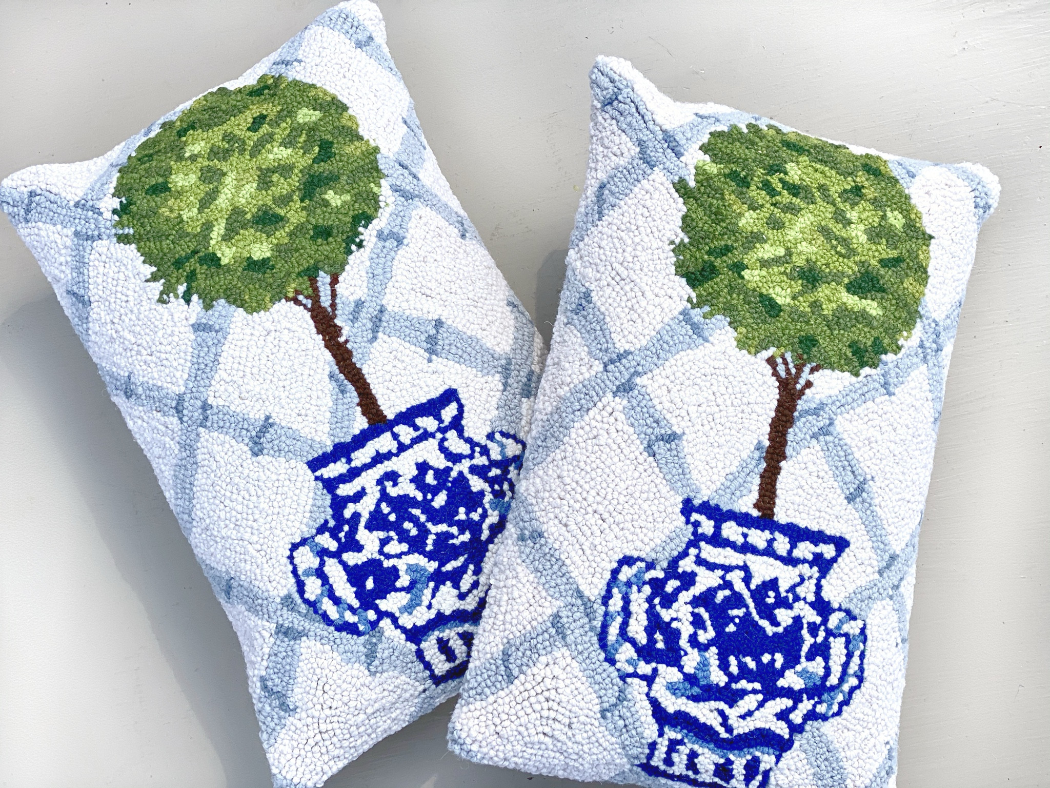 Changing out seasonal decor for spring! Welcoming these fresh blue and white chinoiserie topiary hooked throw pillows! 

#LTKFindsUnder50 #LTKHome #LTKSpringSale