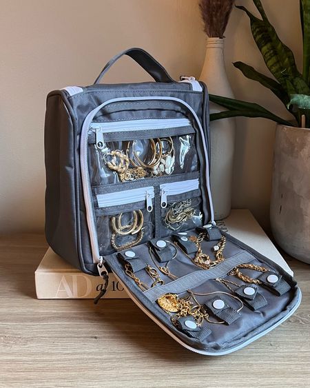 Toiletry case from Amazon with jewelry organizer in back! 

#toiletrycase #travel #amazontravel #travelessentials 

#LTKunder50 #LTKFind #LTKtravel