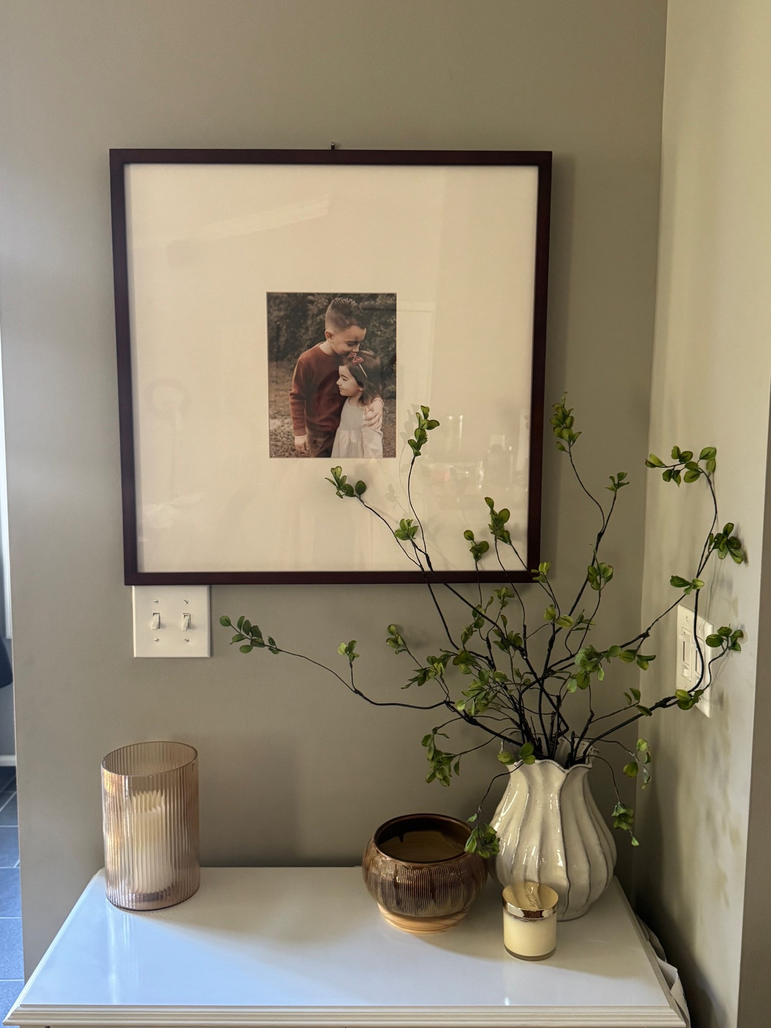 Console table 
Target vase 
Amazon stems 

#LTKHome #LTKSeasonal