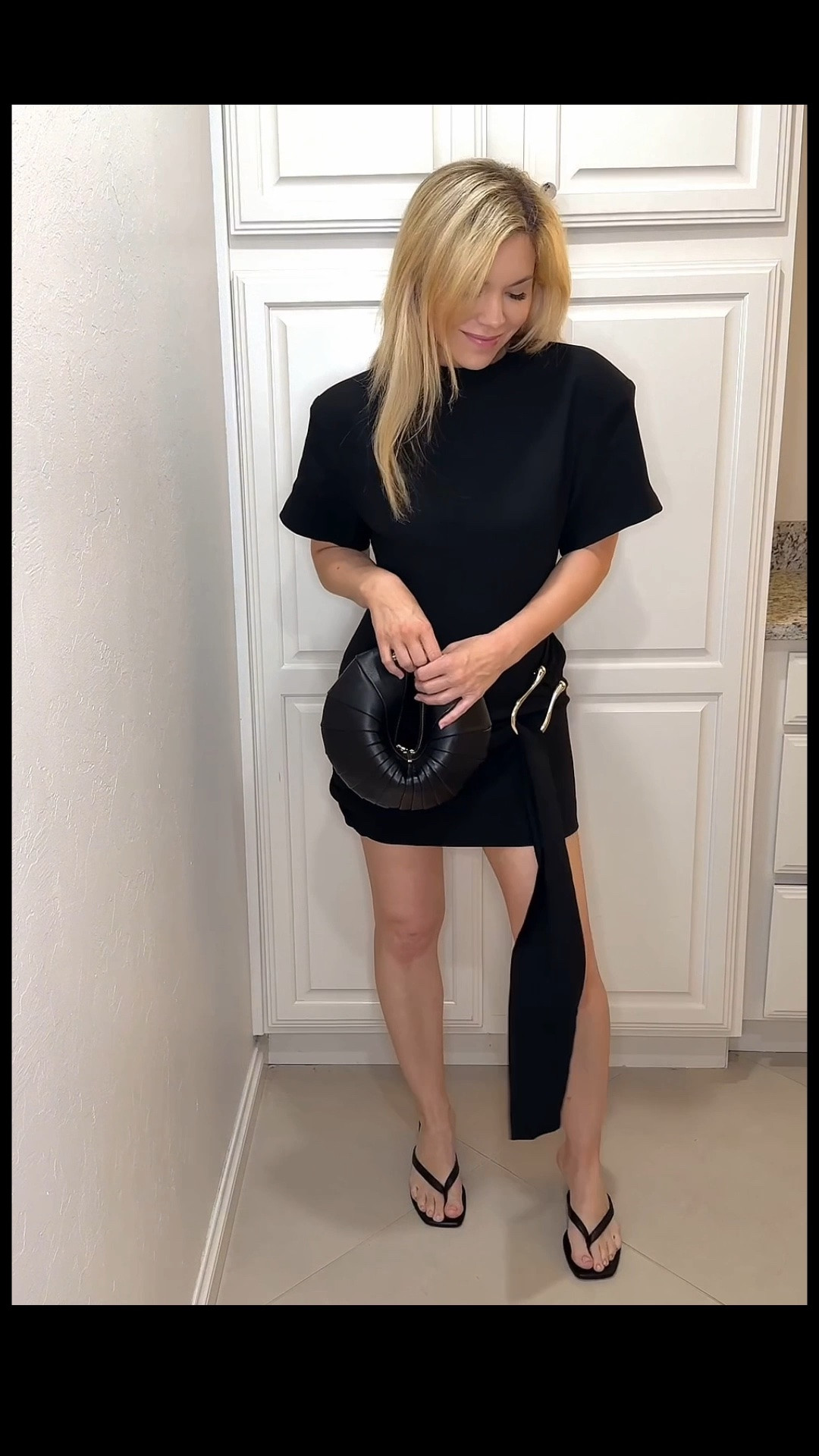 This black dress runs SMALL but has a cute fit! Just take the next biggest size