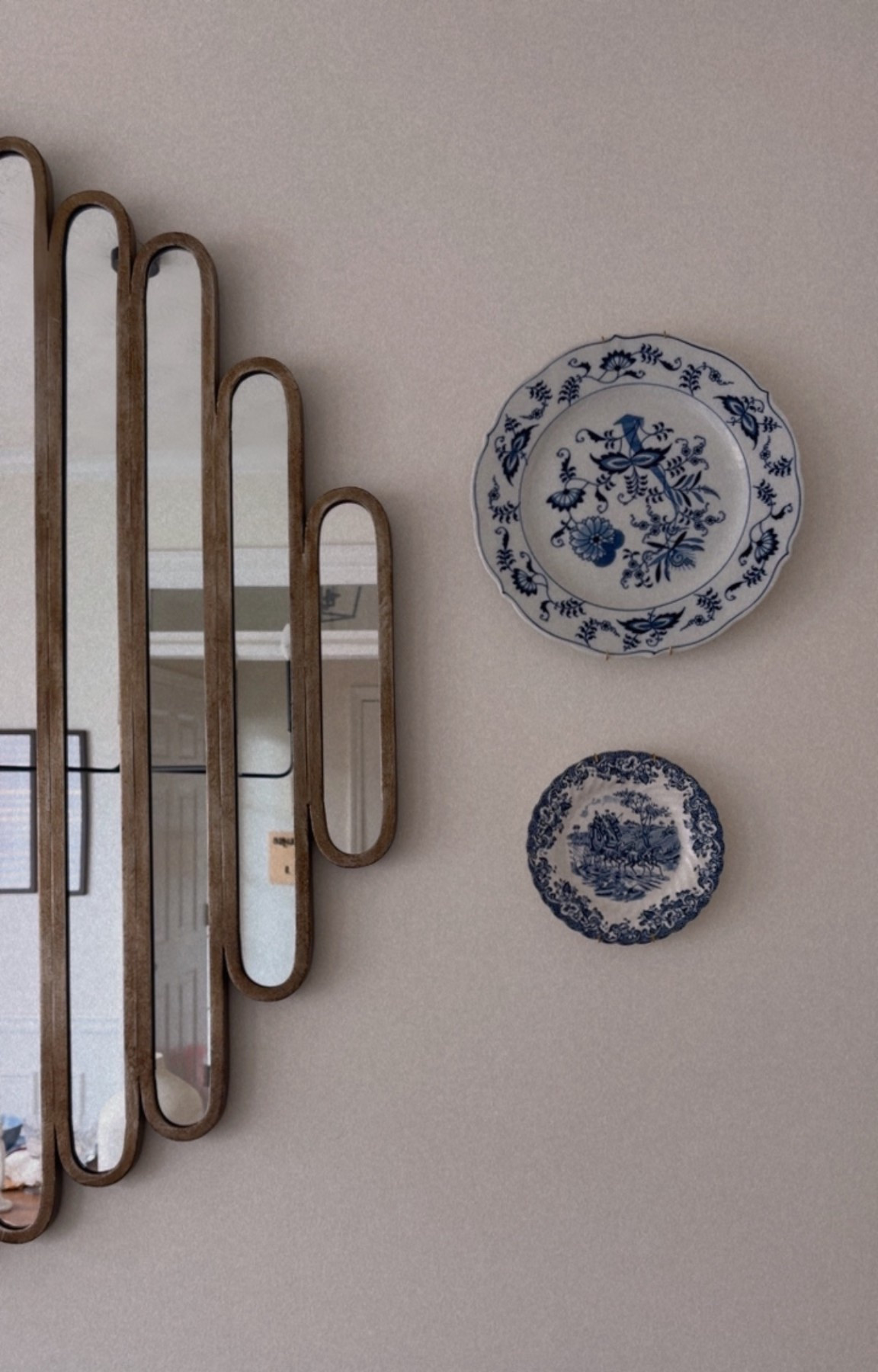 My cute plates! 

Hanging plates mirror home decor 