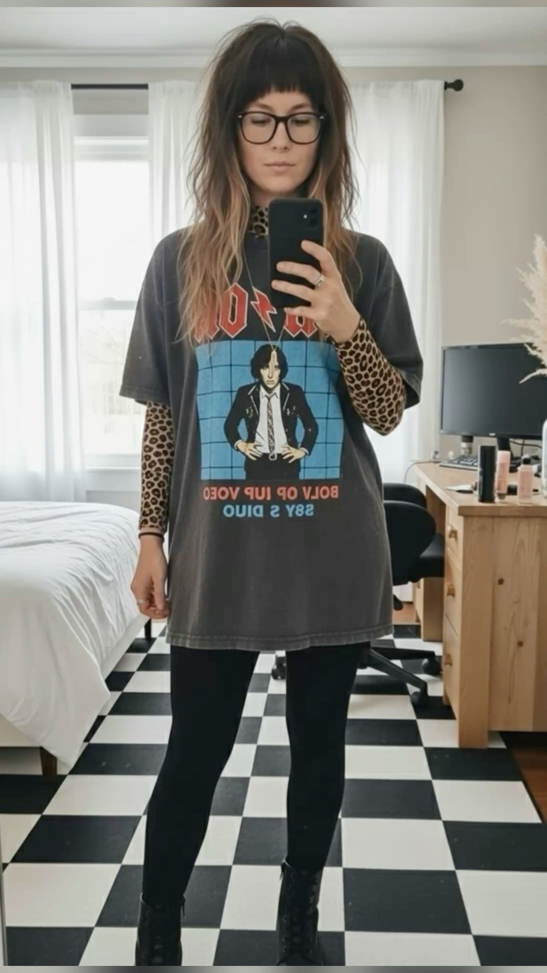 Obsessed with this mix of textures for a moody, everyday look. I paired an oversized AC/DC graphic tee with a leopard print mesh top to add some dimension to the classic all-black base. These chunky combat boots and black leggings are my go-to for a comfortable but edgy "off-duty" fit.

Perfect for a coffee run or a casual concert night!


#LTKootd #LTKmomlife #LTKdayinmylife