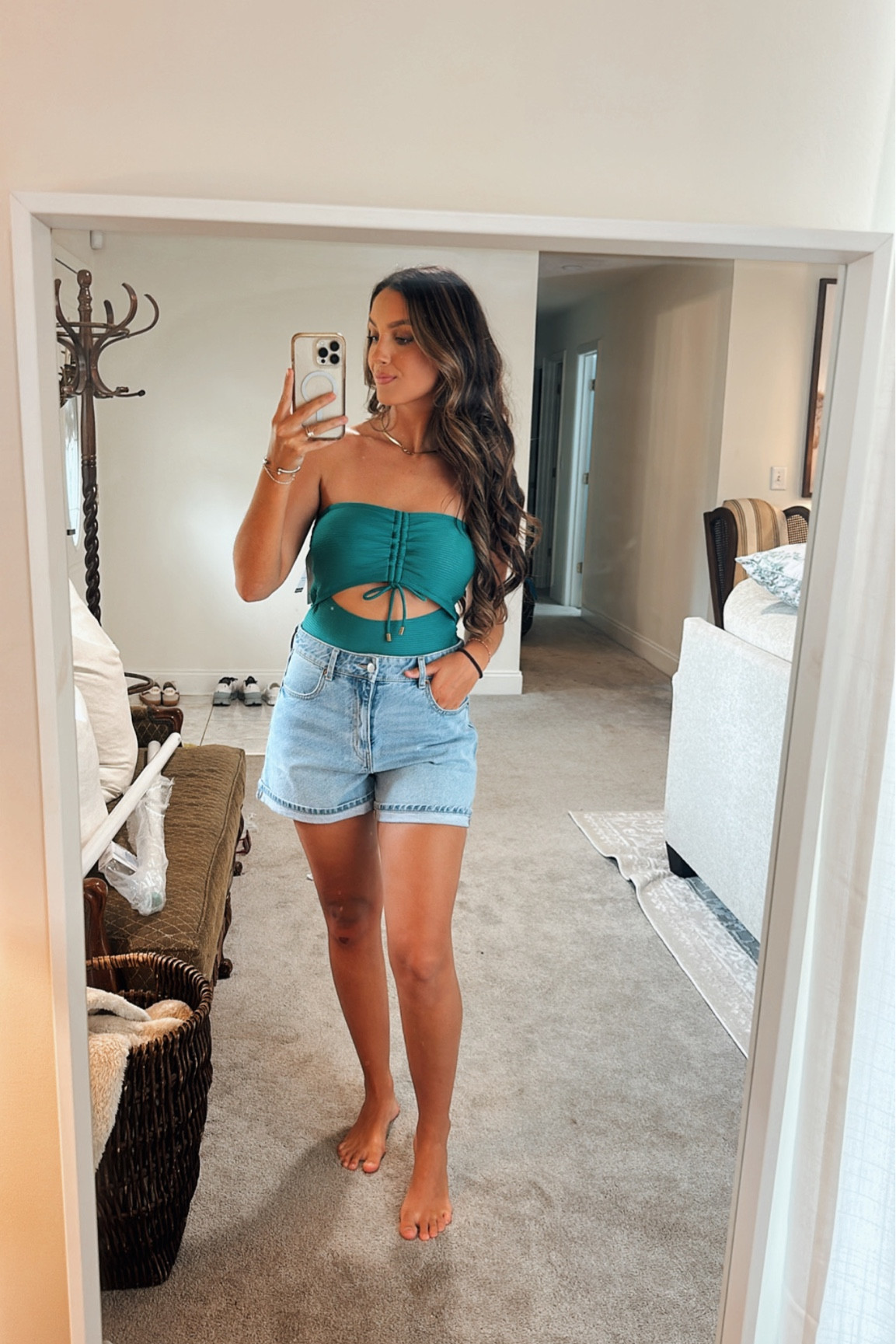 Wearing a size 6 in my shorts & medium (8-10 ) in my swimsuits 