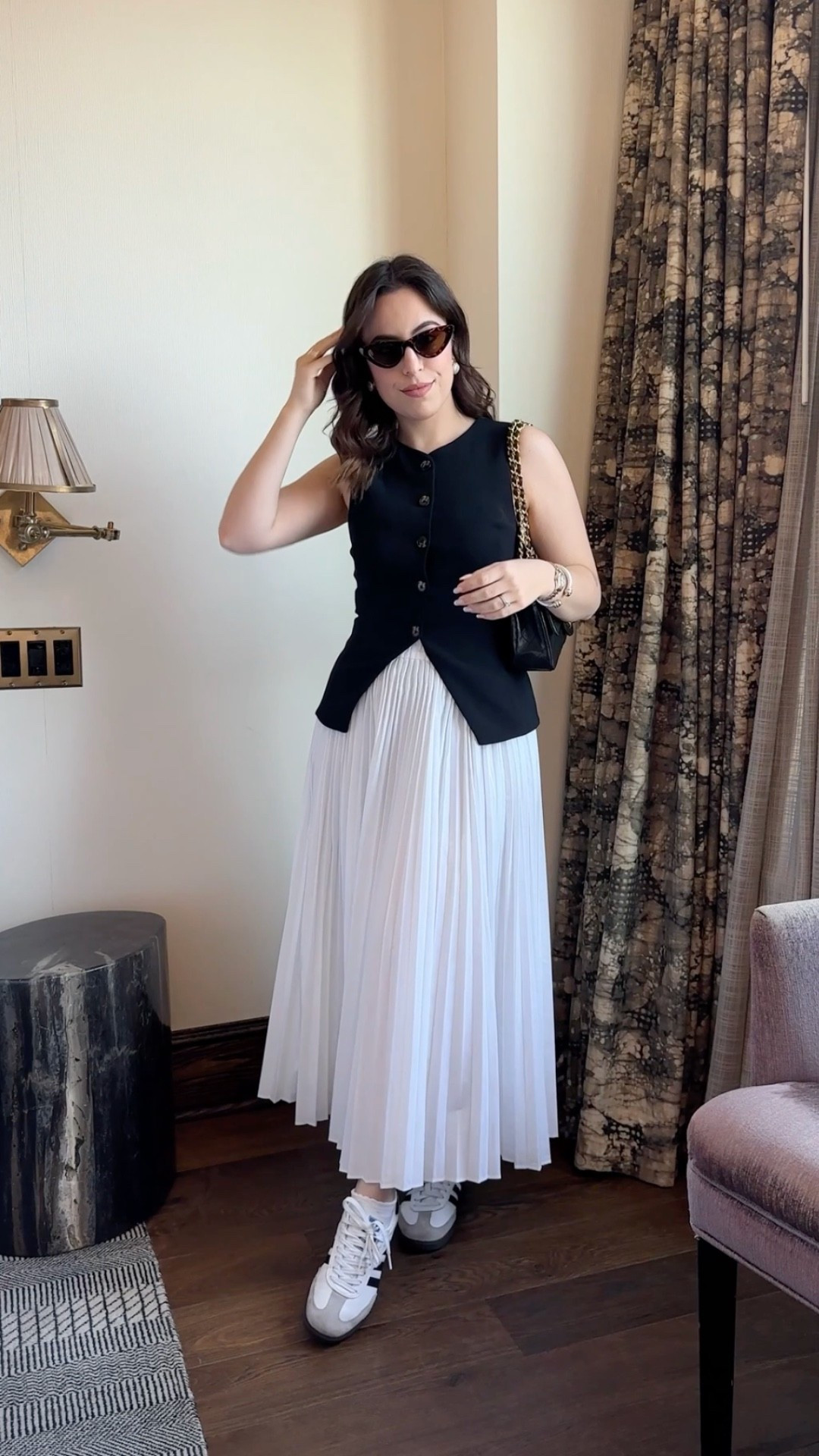 This classic vest and white pleated midi skirt with my Sambas, vintage Chanel, and gold accessories is a combo I keep coming back to. It's just so classy and timeless and works every single time!

Adidas Samba outfit, vintage bag, gold jewelry, capsule wardrobe, elevated basics, effortless style, modest fashion, petite fashion

#LTKootd #LTKPetite #LTKU