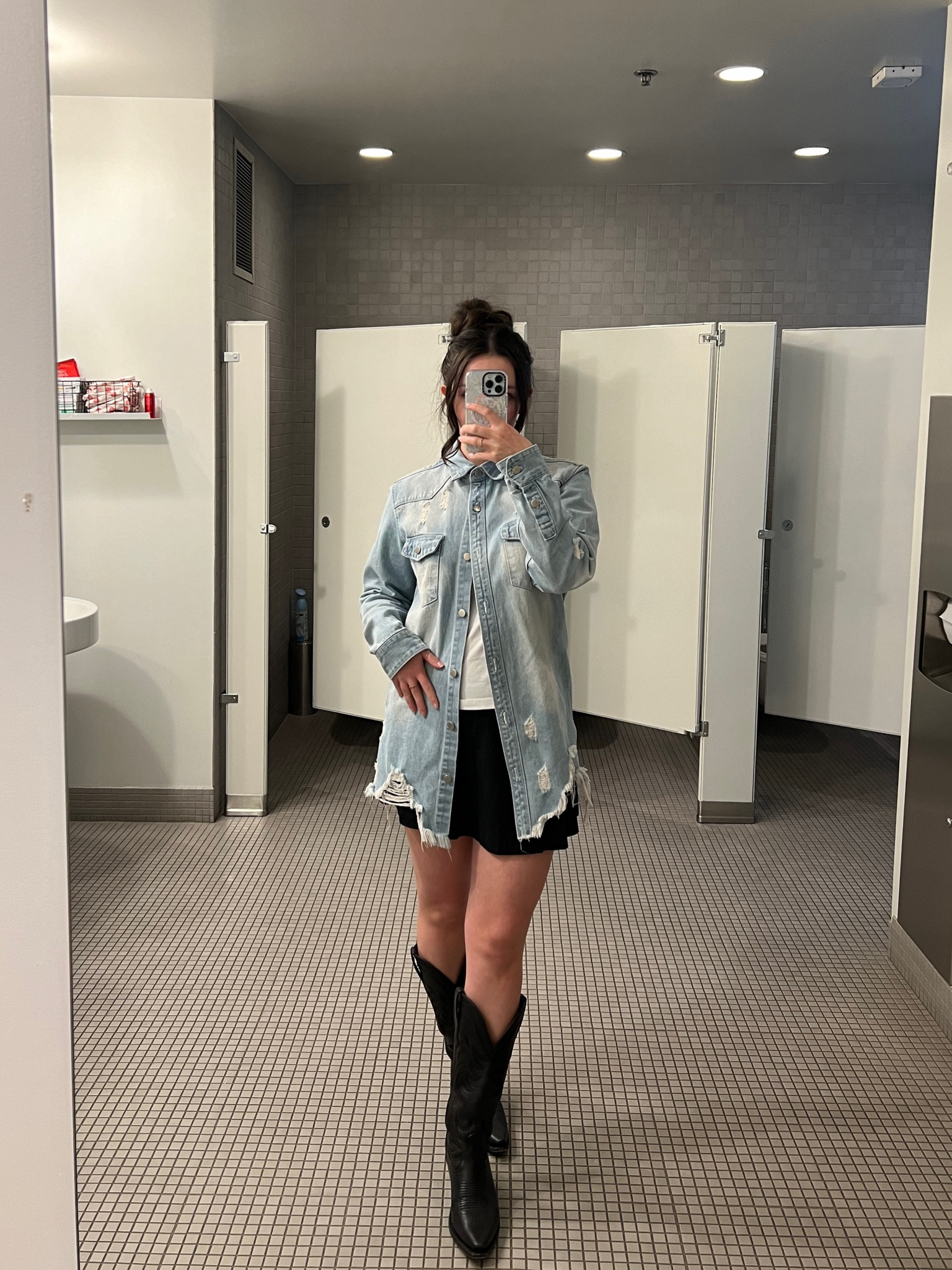 Frayed denim jean jacket, basic white top, black Nike tennis skirt, black cowboy boots

#LTKshoecrush #LTKFestival #LTKbeauty