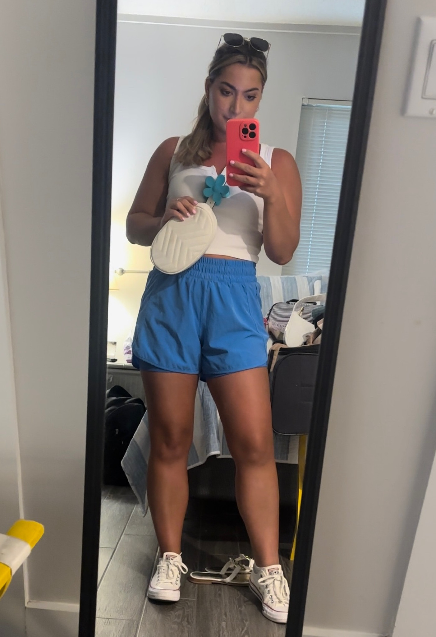 Workout fit
- white cropped button up tank
- women’s blue running shorts with spandex
- white crossbody bag
- converse 
- flower hair claw clip

#LTKstyletip #LTKsalealert #LTKunder50