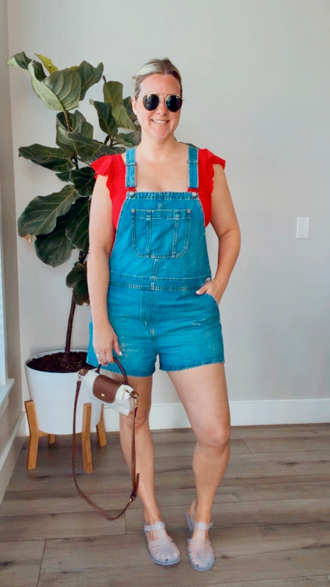 Beach day but make it cute 😎🌊

Denim shortalls + a pop of red = effortless cool-mom vibes.
Jelly sandals are comfy, nostalgic, and back 🙌🏼

Wearing L (TTS) | Shoes TTS
Linking similar sandals✨

#beachstyle #midsizestyle #over40style #casualchic #summerstyle

#LTKOver40 #LTKMidsize #LTKmomlife