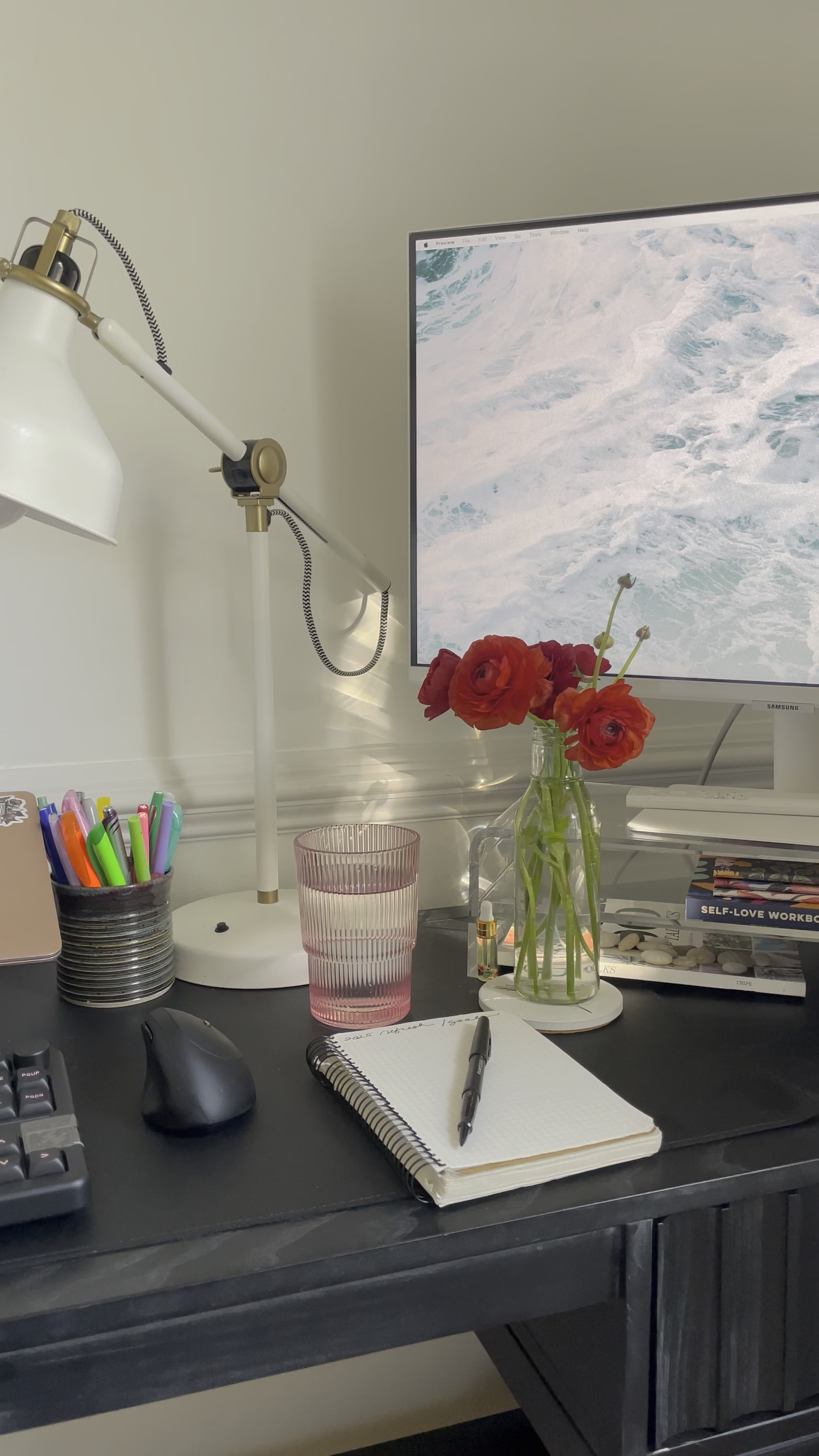 Work from home desktop with monitor 🖥️ 

black desk decorated with flowers, dappled light, eclectic home style 

#LTKHome #LTKFindsUnder50 #LTKFindsUnder100