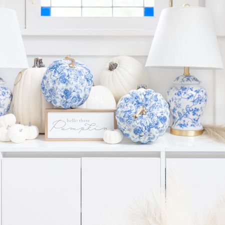 Love these blue and white chinoiserie pumpkins! I made them myself with cocktail napkins, Mod Podge, and medium-sized craft pumpkins 💙🤍 linking all DIY supplies and blue and white Halloween decor! PS- I’m linking to this exact white sideboard, but it’s *really* hard to put together, so I’m linking to 2 similar credenzas (with way better user reviews), as well!

#LTKSeasonal #LTKhome #LTKHalloween