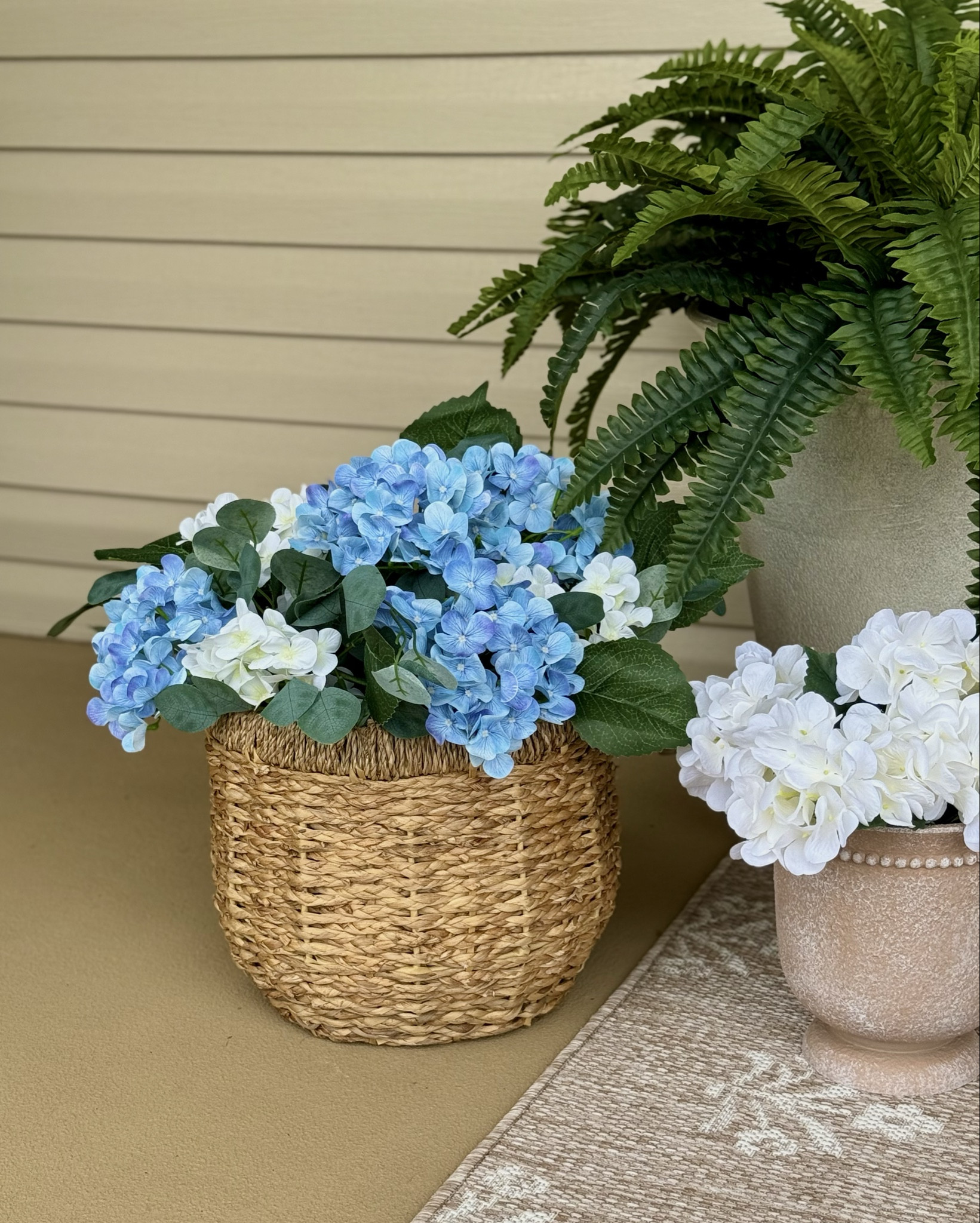 I love the blue hydrangea garland at Walmart for Easter. I’m sure you’ve seen it displayed with a bunny in the center but I really like it this way. I just put some boxes inside the basket and wrapped the garland around and fluffed it until I liked how it looked. I’ll keep this out on through spring and summer! 🤍🩵

#LTKSeasonal #LTKHome